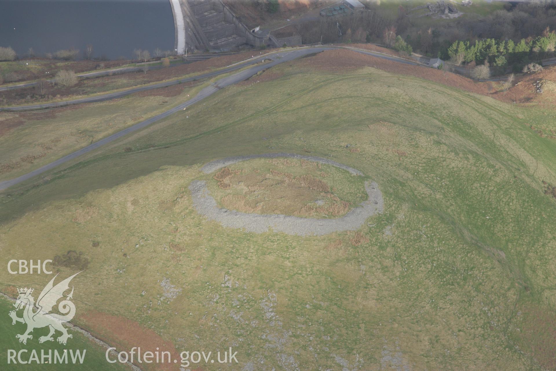 RCAHMW colour oblique photograph of Pen-y-Gaer, Llanidloes. Taken by Toby Driver on 22/03/2011.