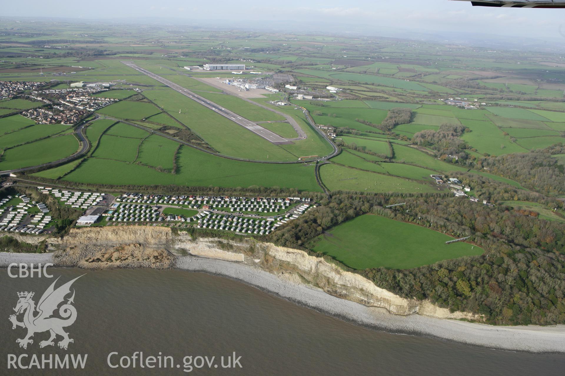 RCAHMW colour oblique photograph of Bulwarks Camp Hillfort, with landslip. Taken by Toby Driver on 17/11/2011.