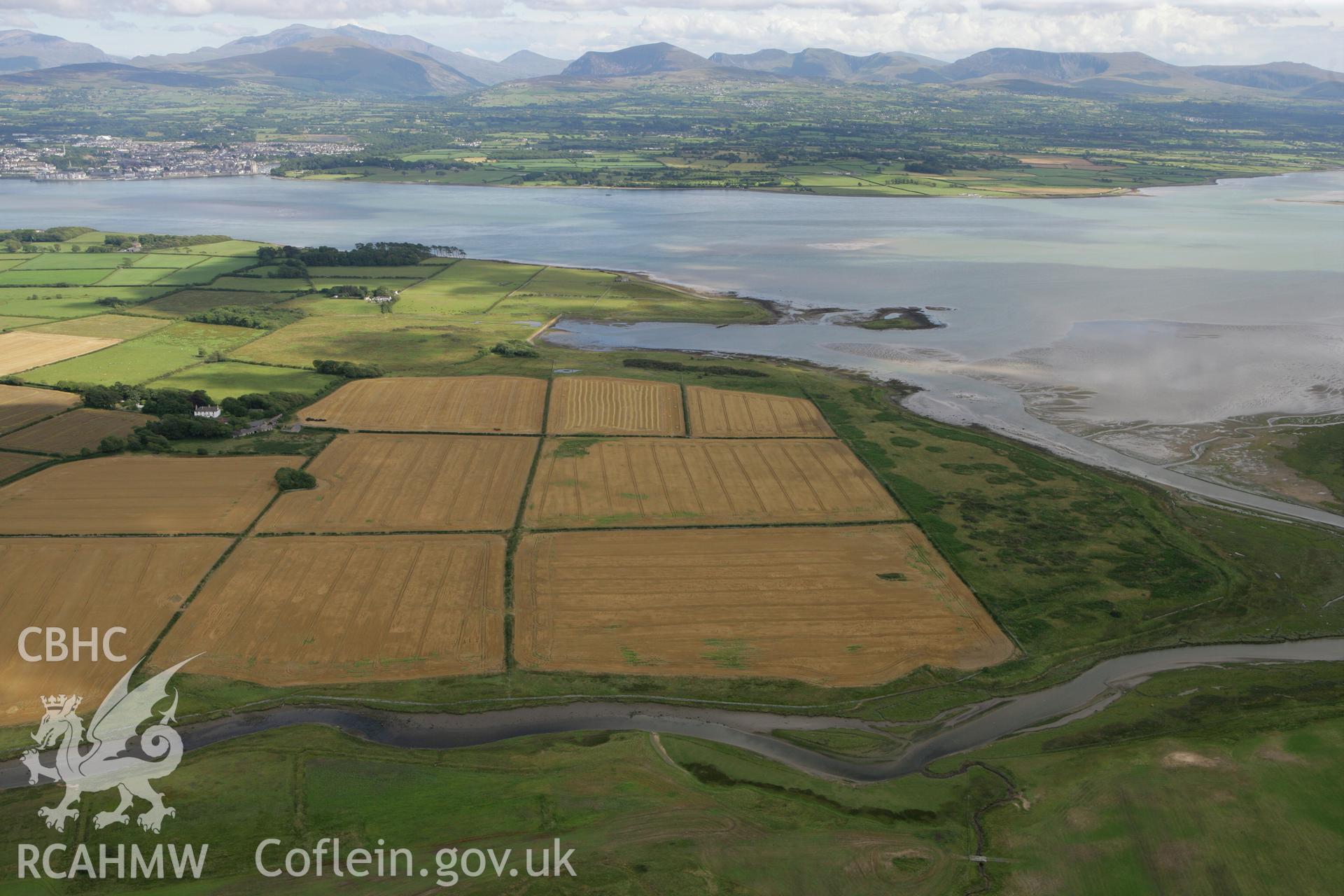 RCAHMW colour oblique photograph of Rhuddgaer, Roman settlement, from north-west. Taken by Toby Driver on 20/07/2011.