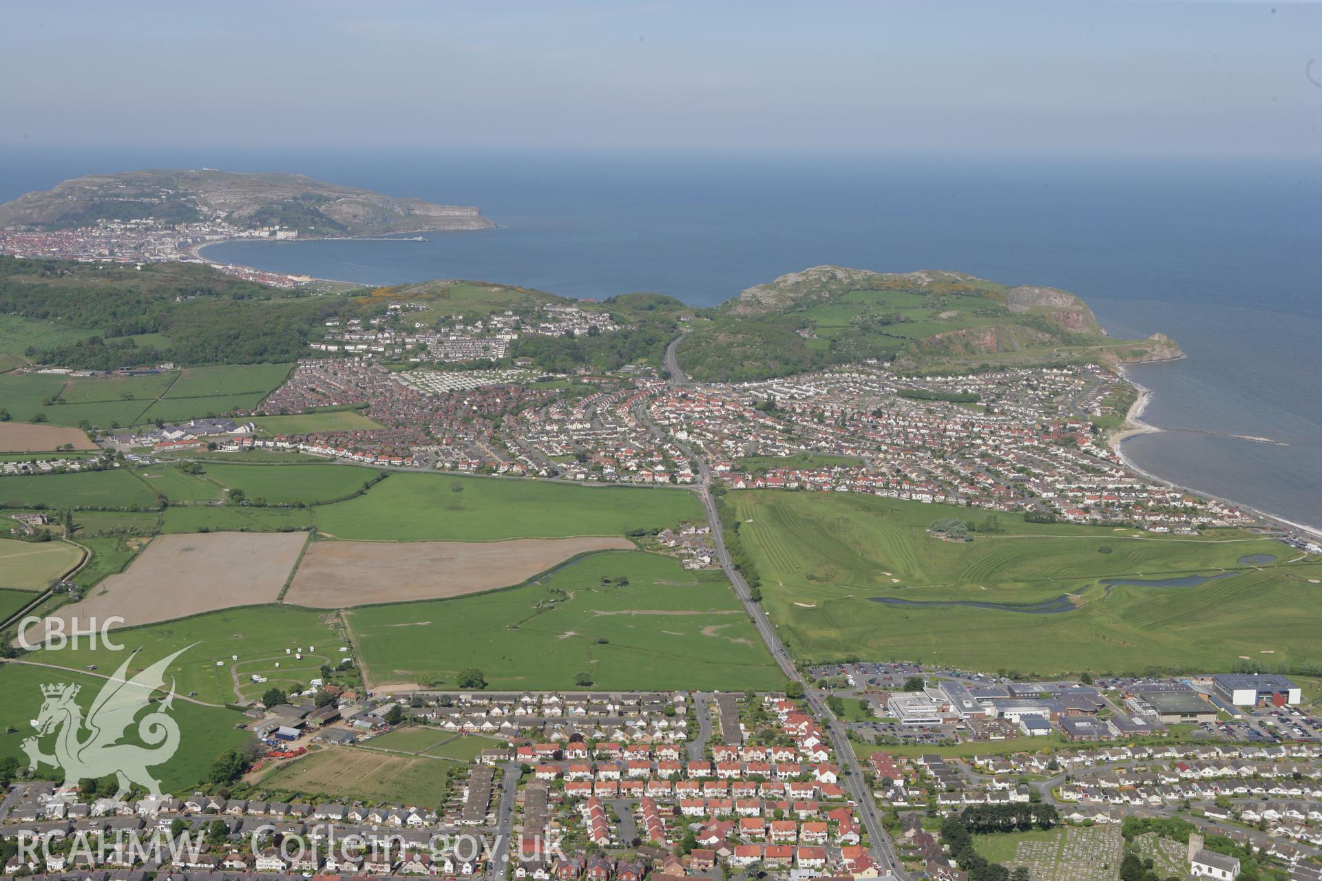 RCAHMW colour oblique photograph of Llandrillo-yn-Rhos. Taken by Toby Driver on 03/05/2011.