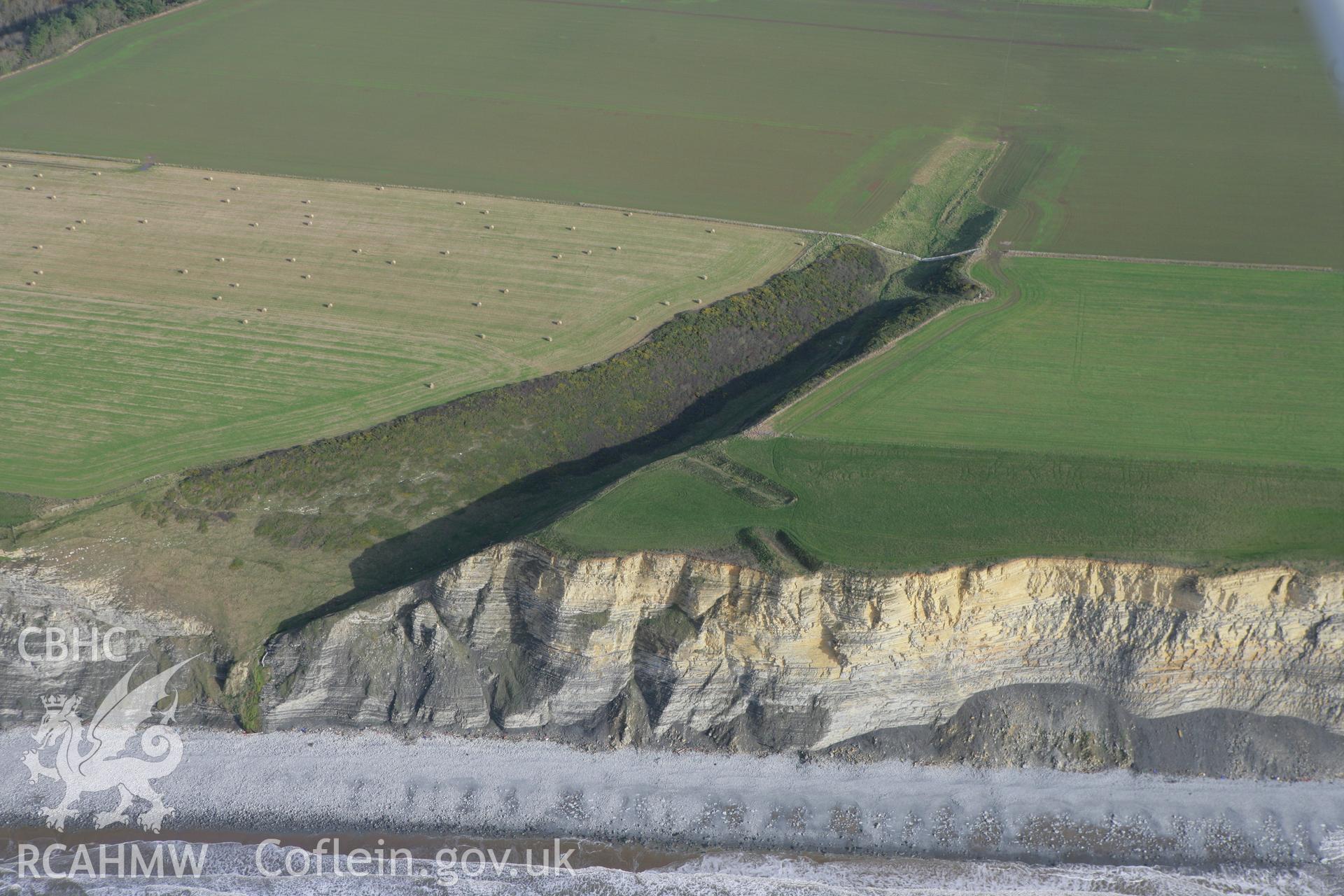 RCAHMW colour oblique photograph of Cwm Bach Enclosure. Taken by Toby Driver on 17/11/2011.