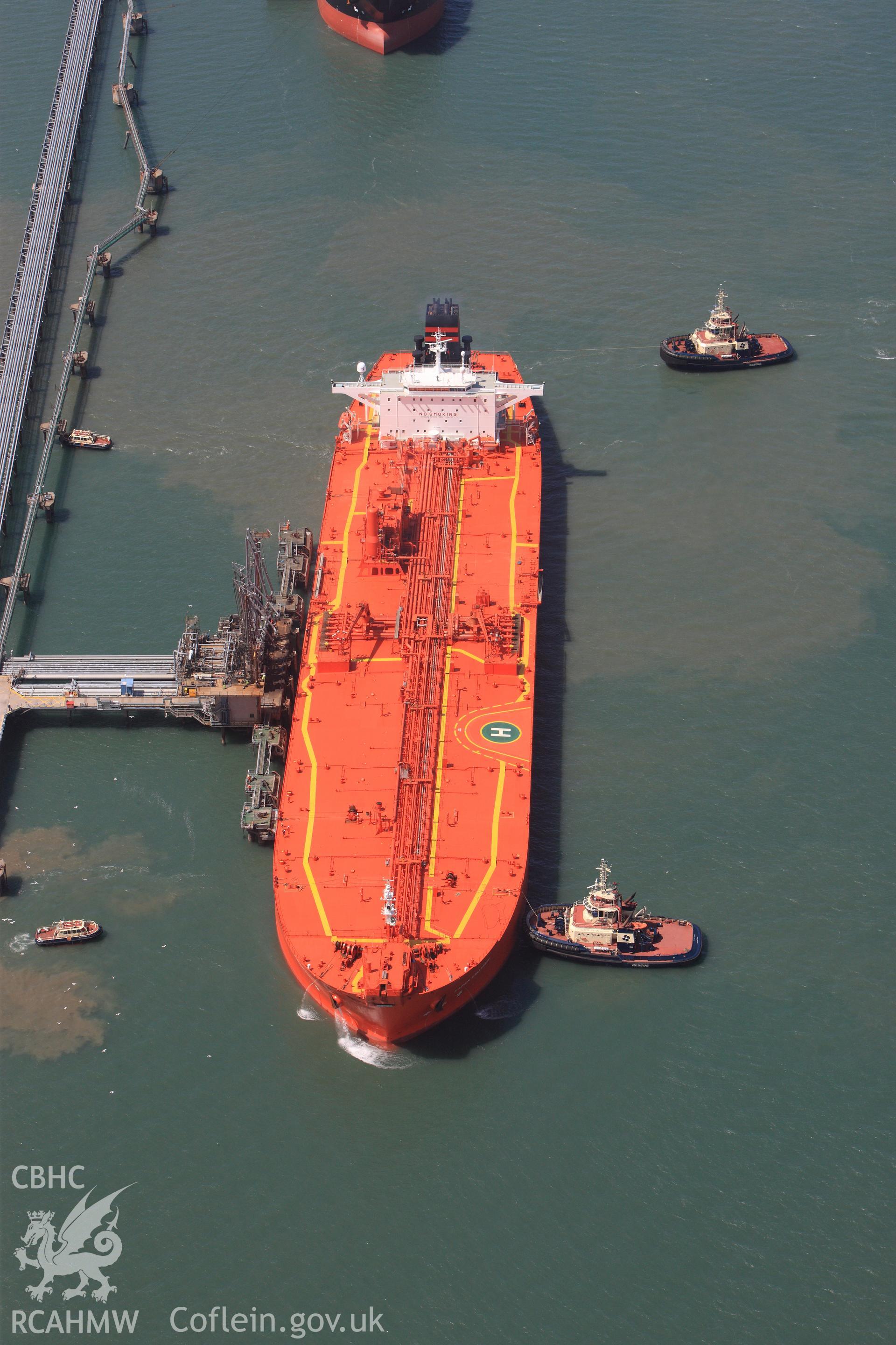 RCAHMW colour oblique photograph of Ships moored along Bullwell Bay Jetty. Taken by Toby Driver on 24/05/2011.