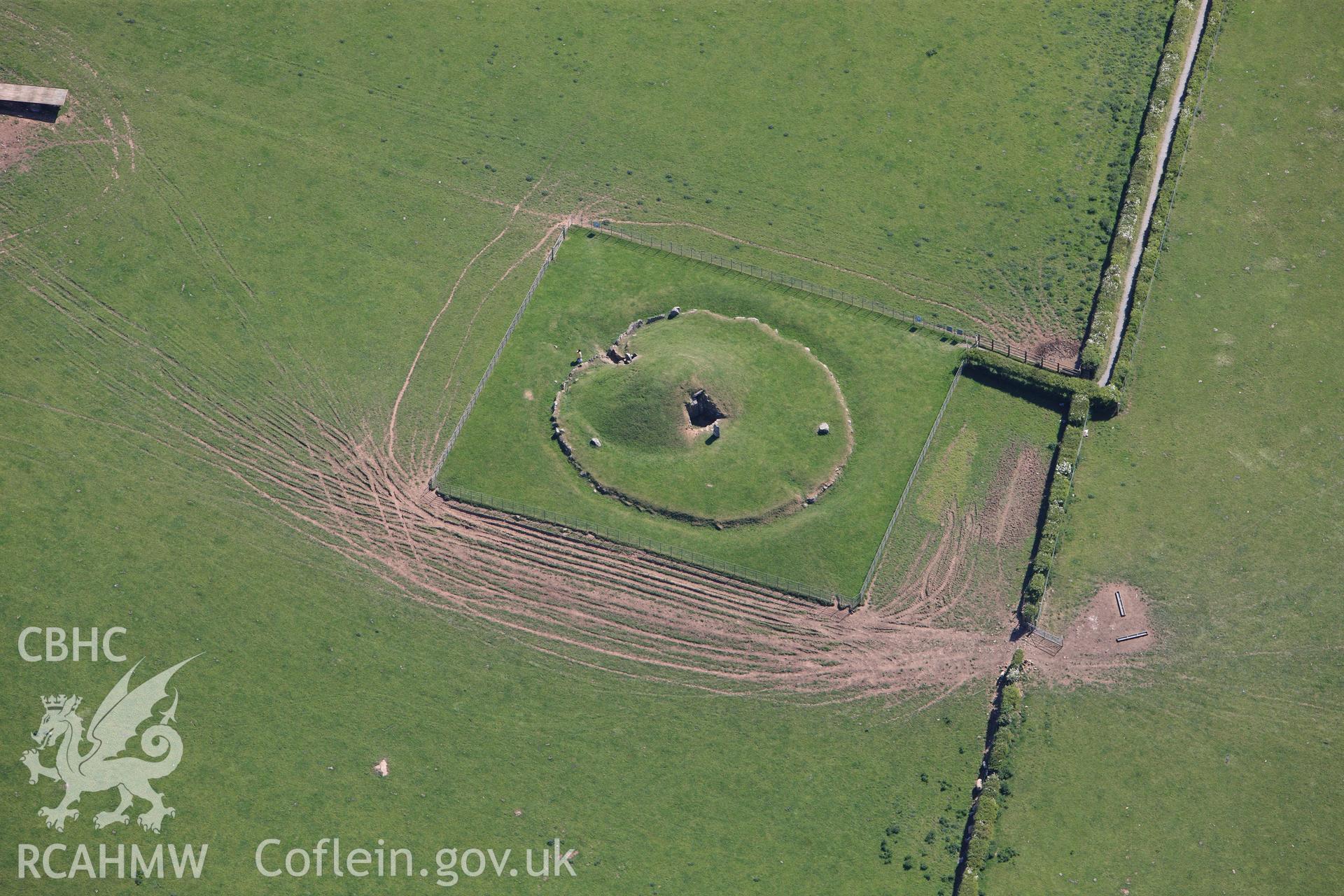 RCAHMW colour oblique photograph of Bryn Celli Ddu Chambered Tomb. Taken by Toby Driver on 03/05/2011.