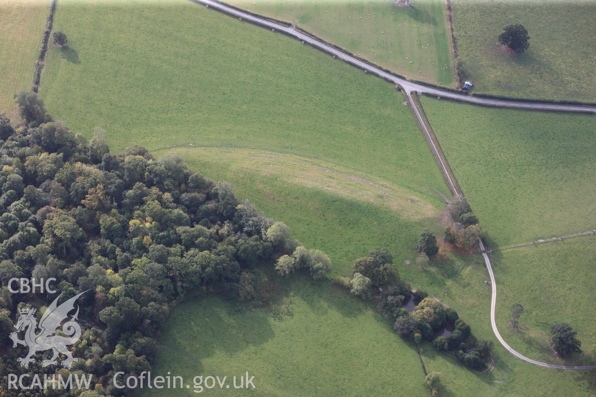 RCAHMW colour oblique photograph of Plas Uchaf, Enclosure. Taken by Toby Driver on 04/10/2011.