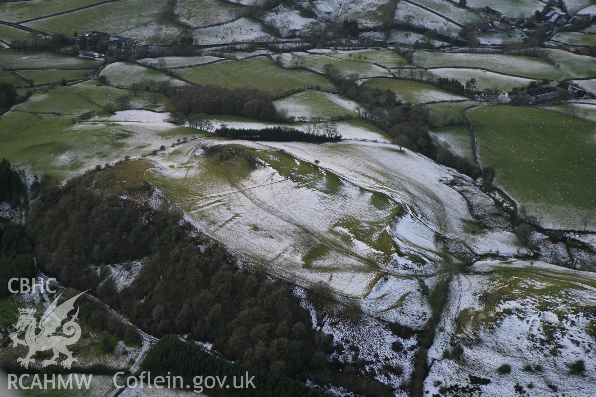 RCAHMW colour oblique photograph of Graig Fawr camp, hillfort. Taken by Toby Driver on 18/12/2011.