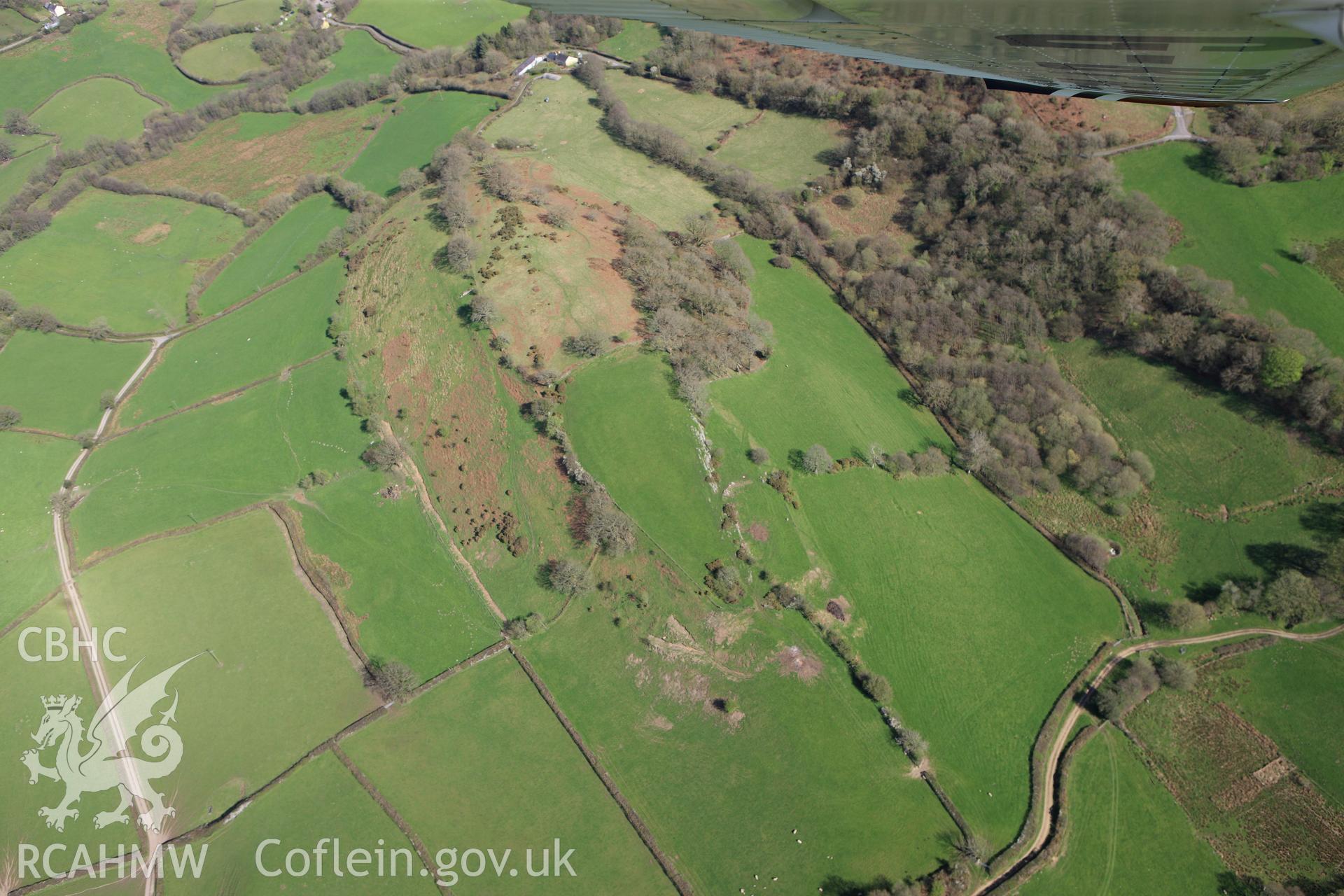 RCAHMW colour oblique photograph of Llwyndu Camp. Taken by Toby Driver on 08/04/2011.