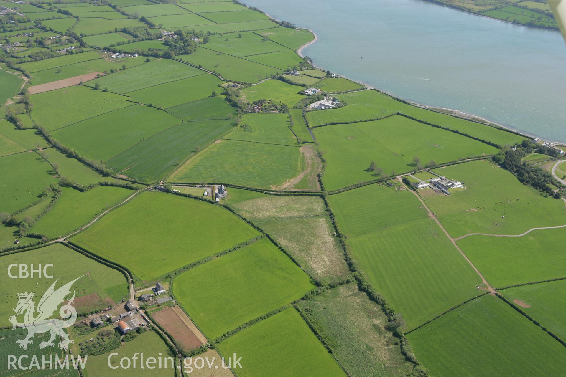 RCAHMW colour oblique photograph of Tai Cochion Roman Settlement, from the west. Taken by Toby Driver on 03/05/2011.