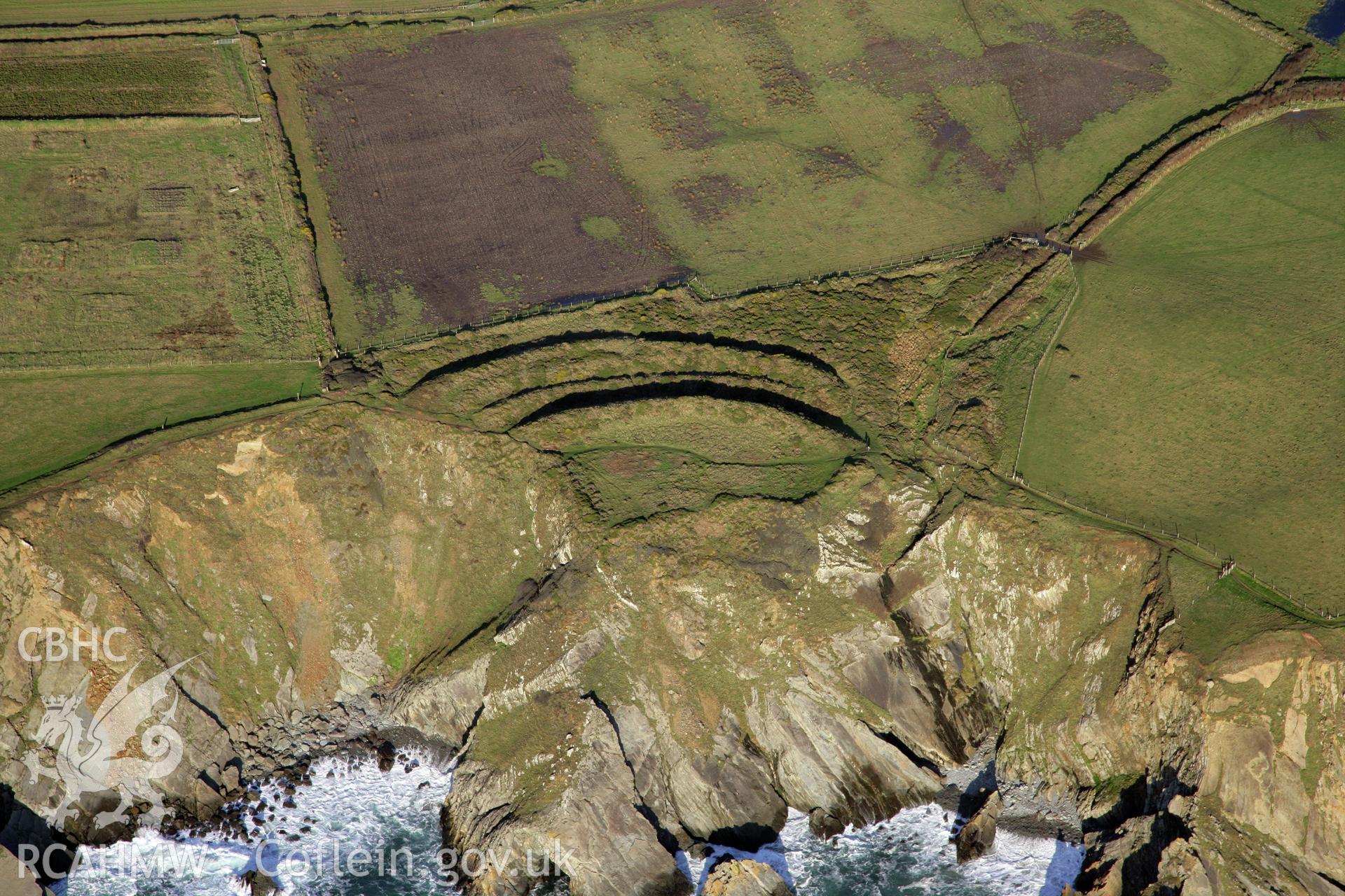 RCAHMW colour oblique photograph of Marloes Sound Rath promontory fort, viewed from the south. Taken by O. Davies & T. Driver on 22/11/2013.