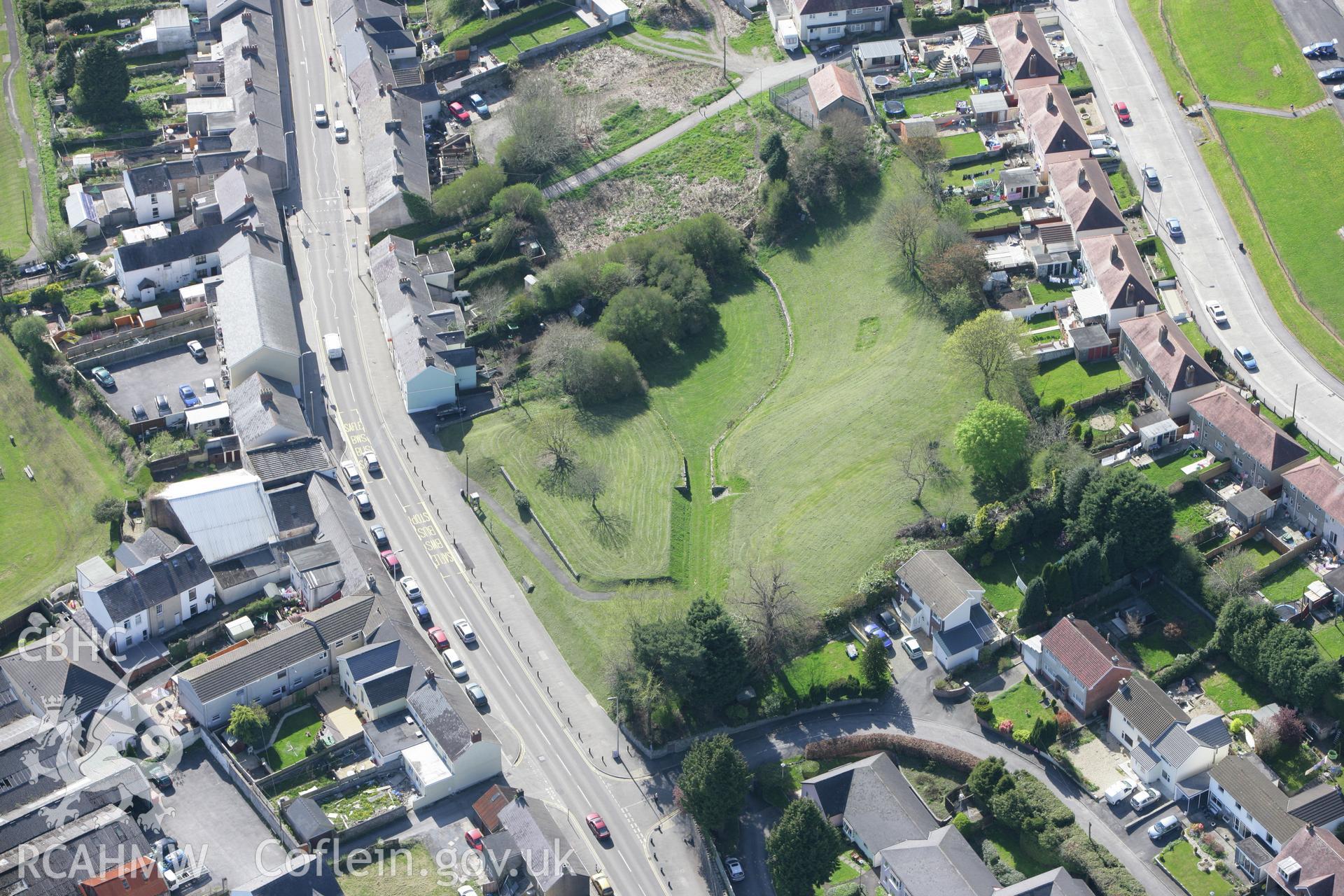 RCAHMW colour oblique photograph of Carmarthen Roman Amphitheatre. Taken by Toby Driver on 08/04/2011.