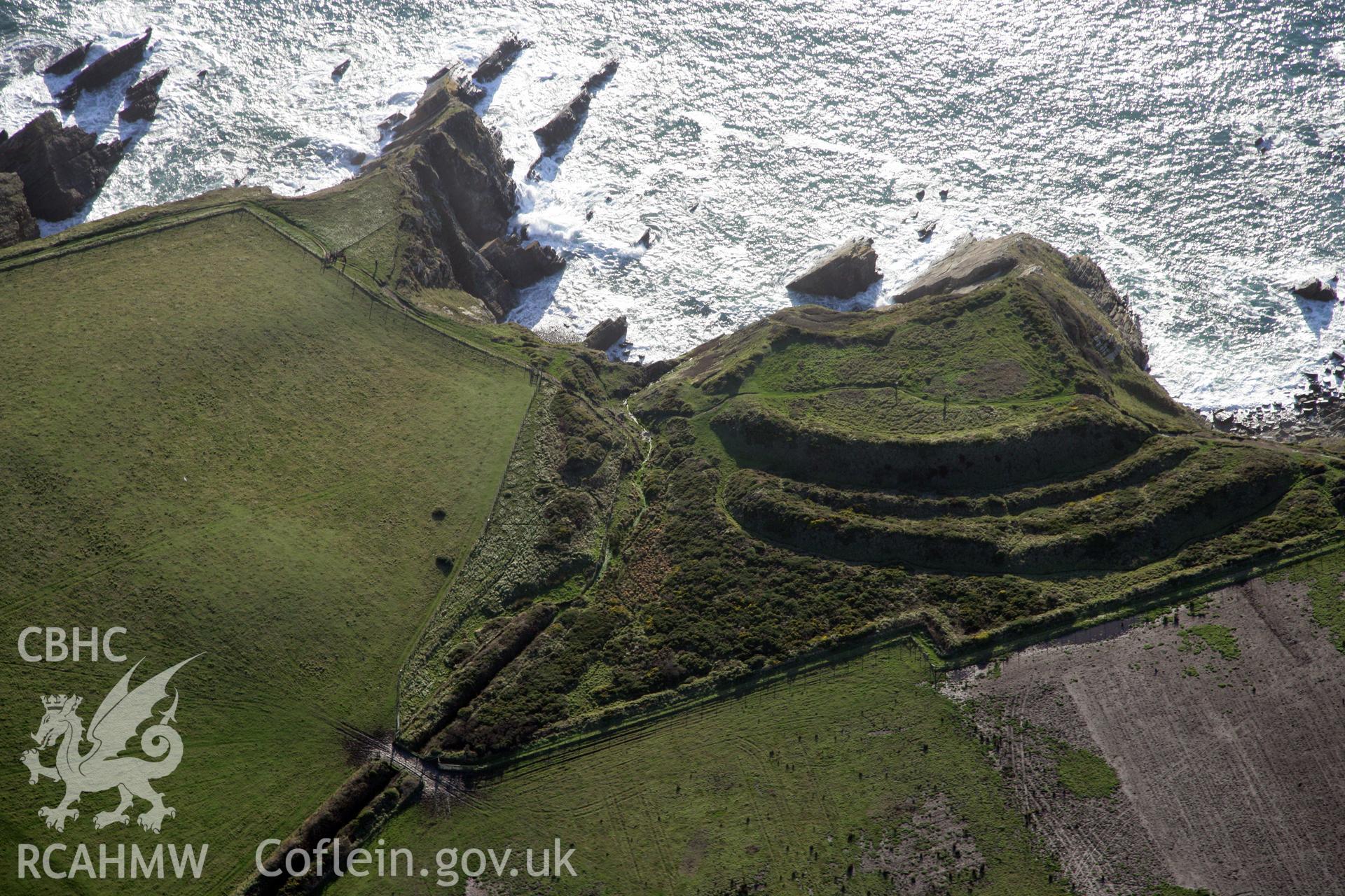 RCAHMW colour oblique photograph of Marloes Sound Rath promontory fort, viewed from the north-east. Taken by O. Davies & T. Driver on 22/11/2013.