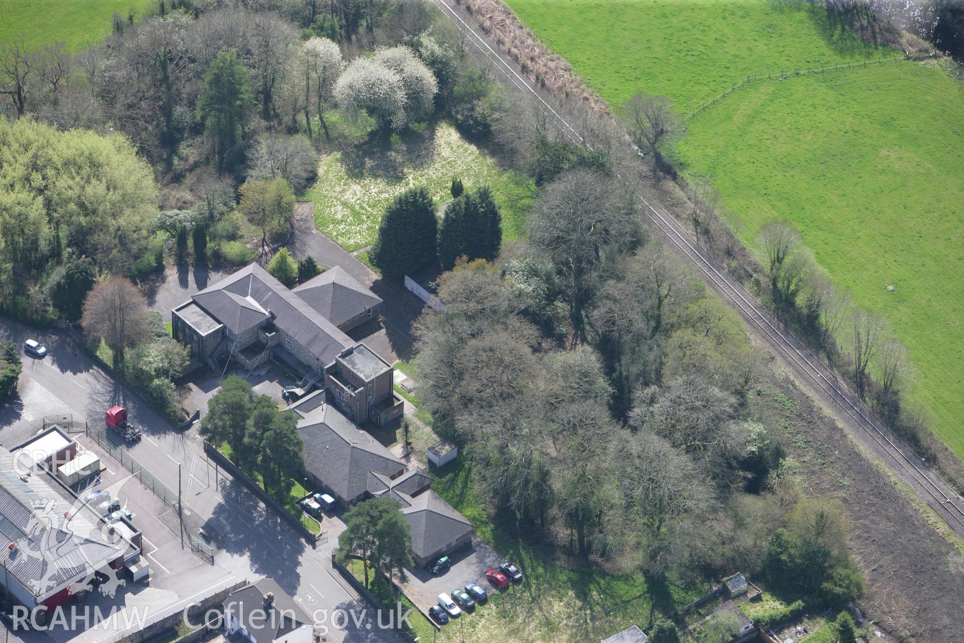 RCAHMW colour oblique photograph of Tir-y-Dail Motte and Bailey, Ammanford. Taken by Toby Driver on 08/04/2011.