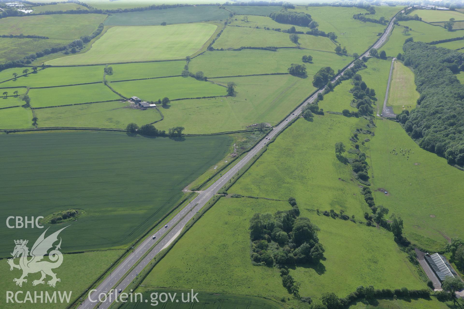 RCAHMW colour oblique photograph of Corrwg mounds. Taken by Toby Driver on 13/06/2011.