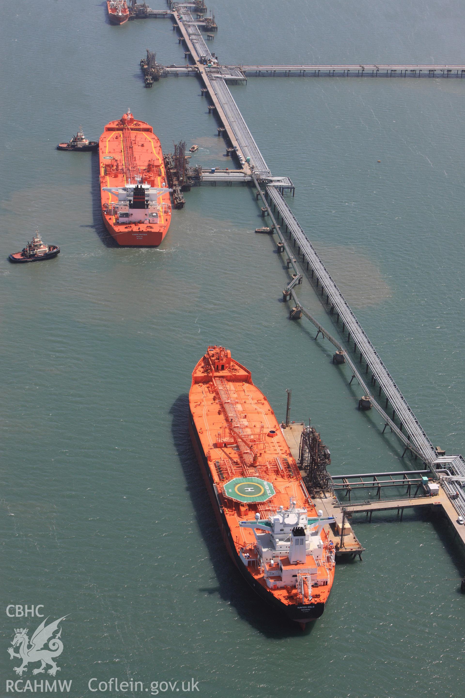 RCAHMW colour oblique photograph of Ships moored along Bullwell Bay Jetty. Taken by Toby Driver on 24/05/2011.