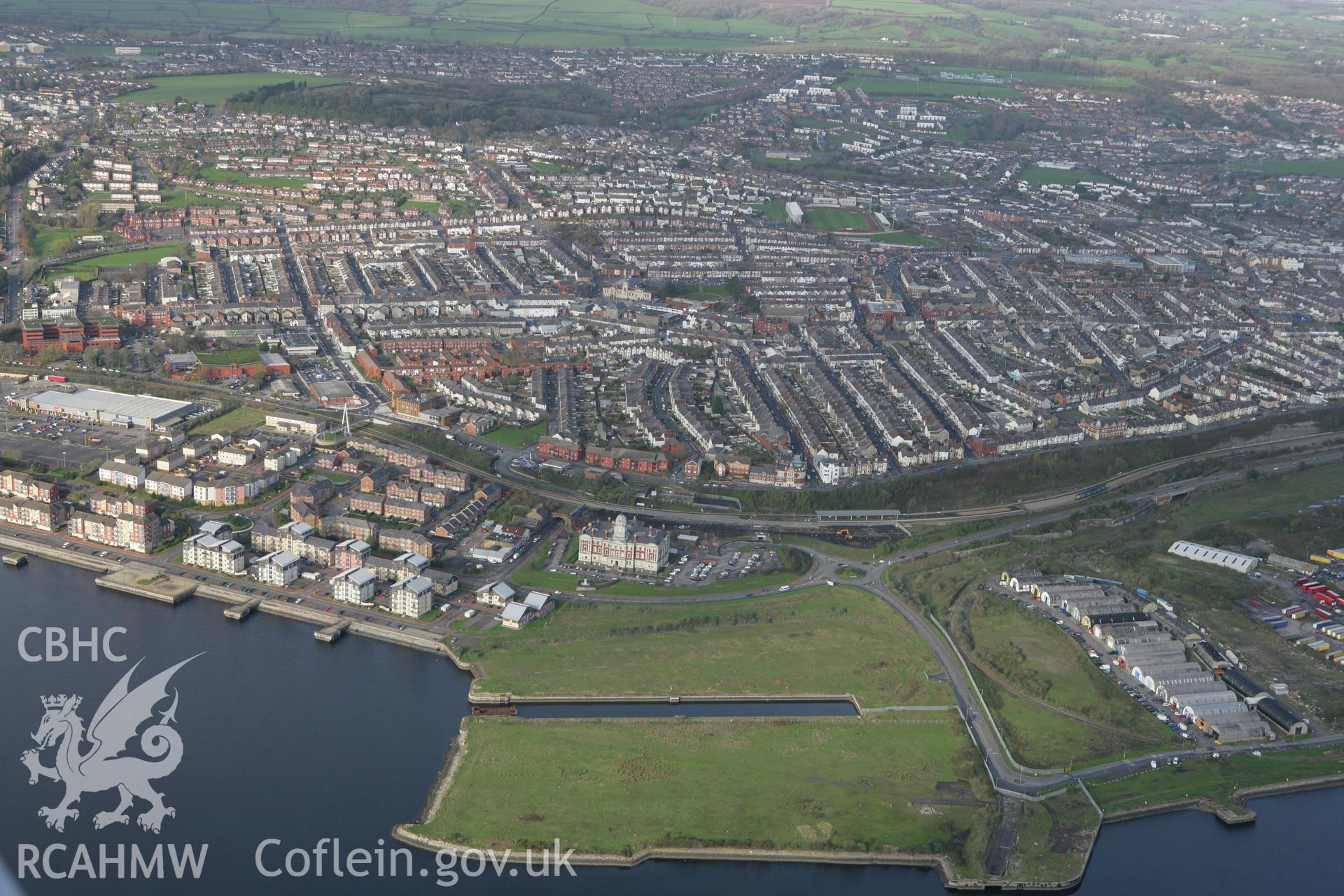 RCAHMW colour oblique photograph of Barry Docks, looking north towards Barry. Taken by Toby Driver on 17/11/2011.