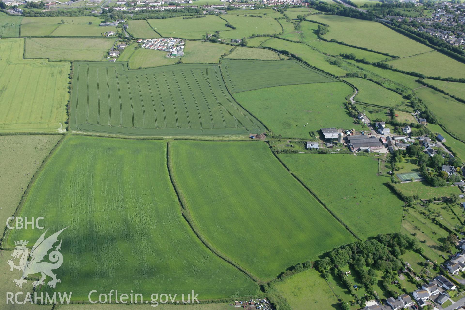 RCAHMW colour oblique photograph of Llanmaes prehistoric settlement and hoard site. Taken by Toby Driver on 13/06/2011.