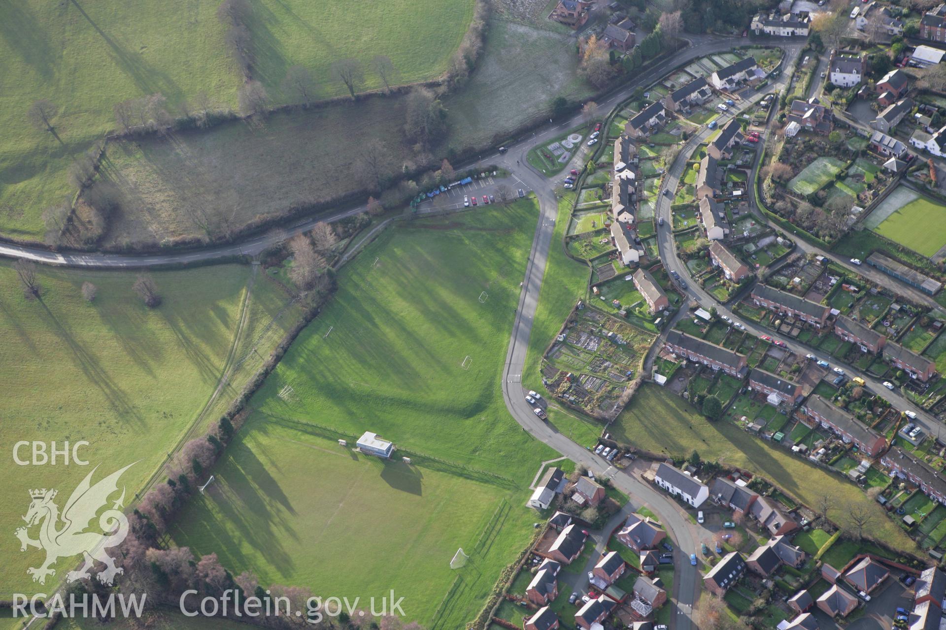 RCAHMW colour oblique photograph of Maldwyn Way, Montgomery. Earthwork of modern playing field. Taken by Toby Driver on 18/12/2011.