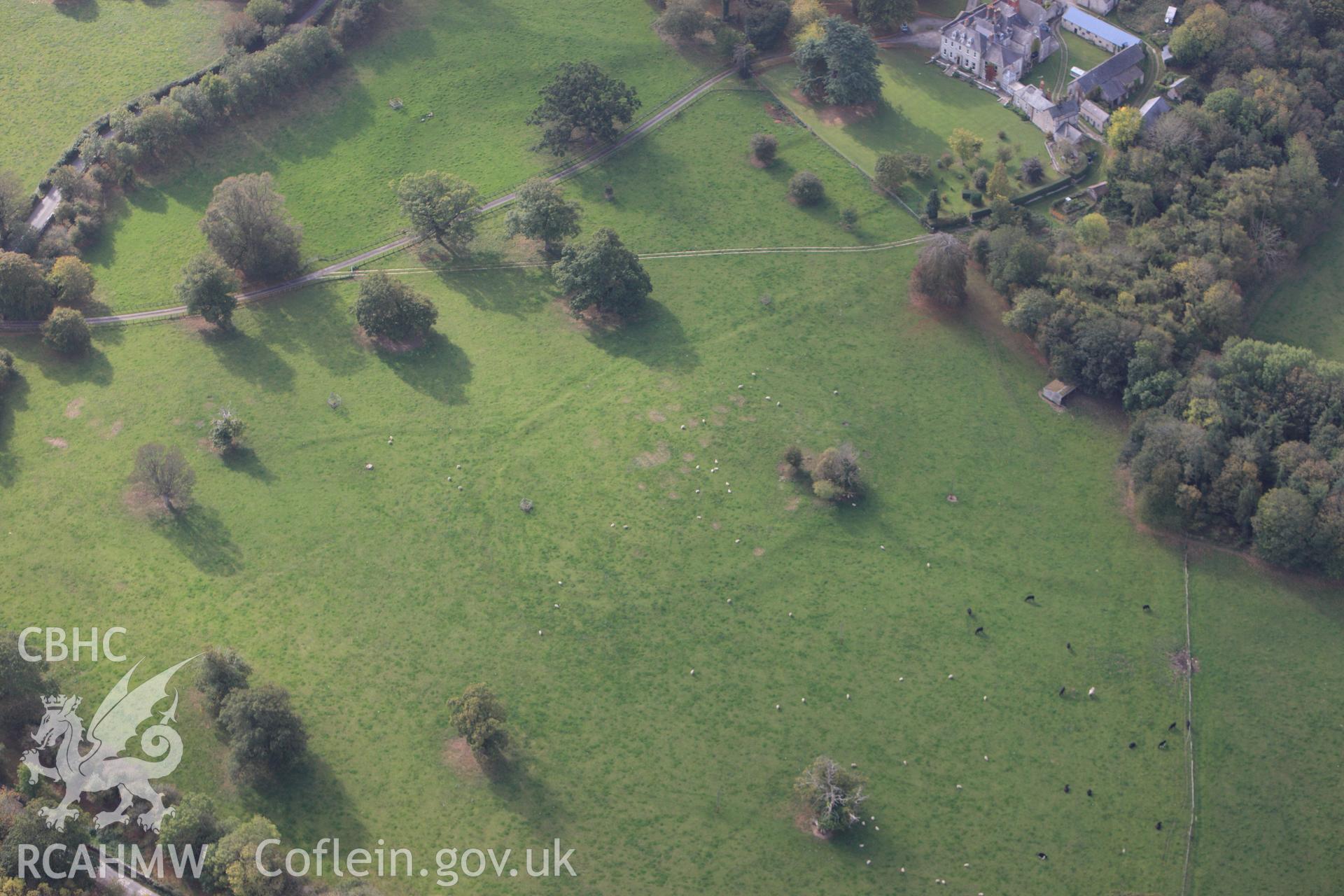 RCAHMW colour oblique photograph of Garn, Henllan, Earthworks. Taken by Toby Driver on 04/10/2011.