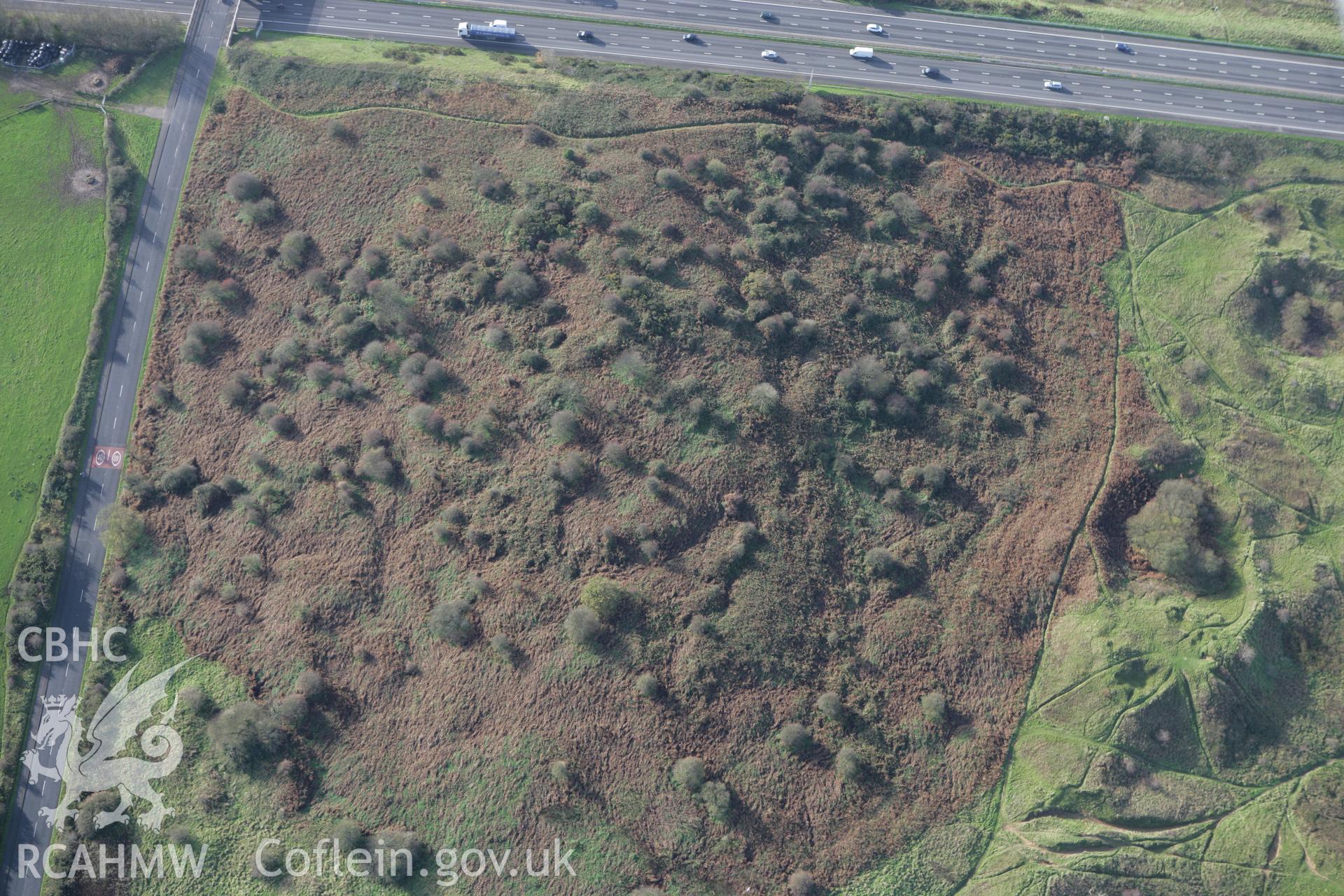 RCAHMW colour oblique photograph of Croes y Ddadl Enclosure. Taken by Toby Driver on 17/11/2011.