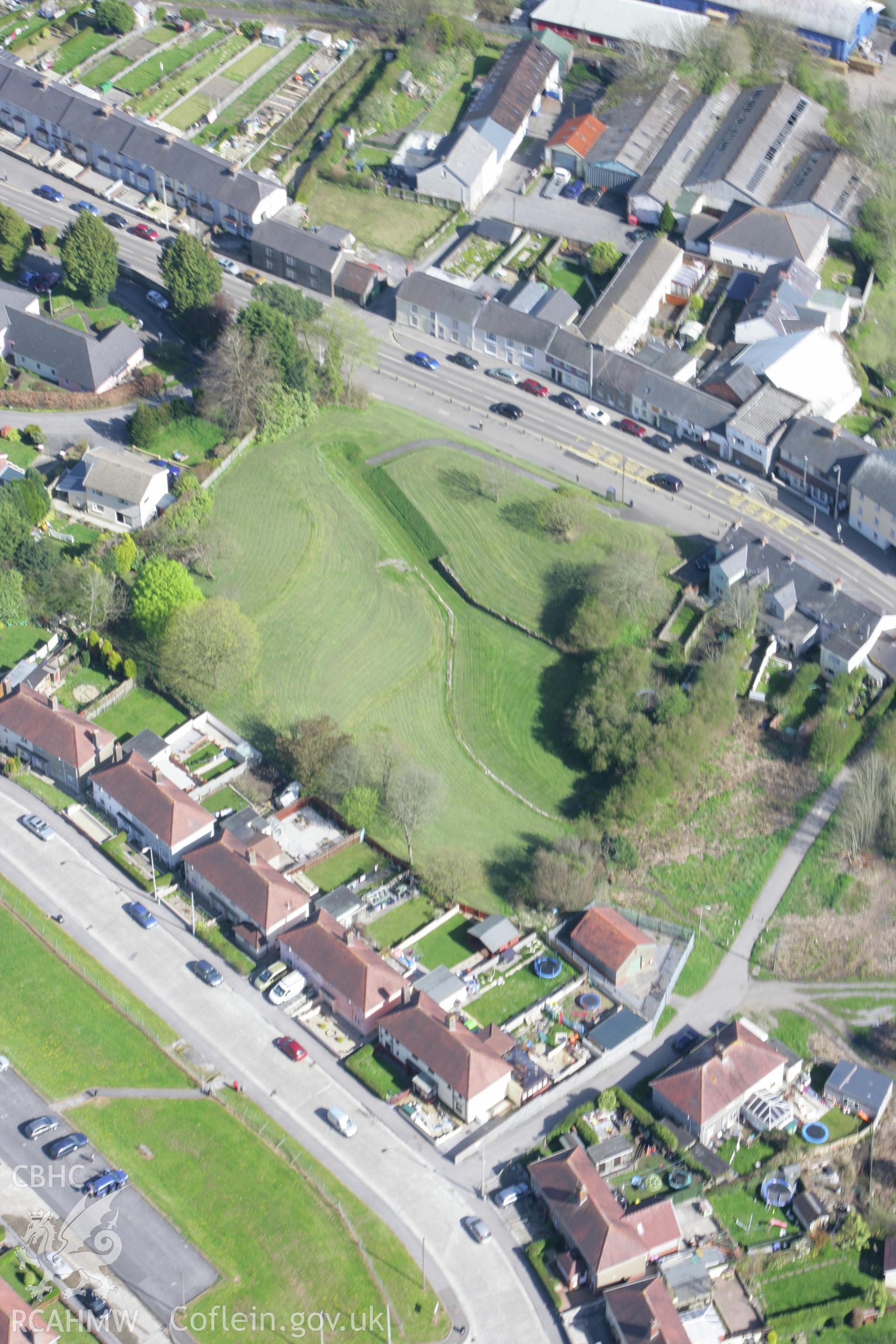 RCAHMW colour oblique photograph of Carmarthen Roman Amphitheatre. Taken by Toby Driver on 08/04/2011.