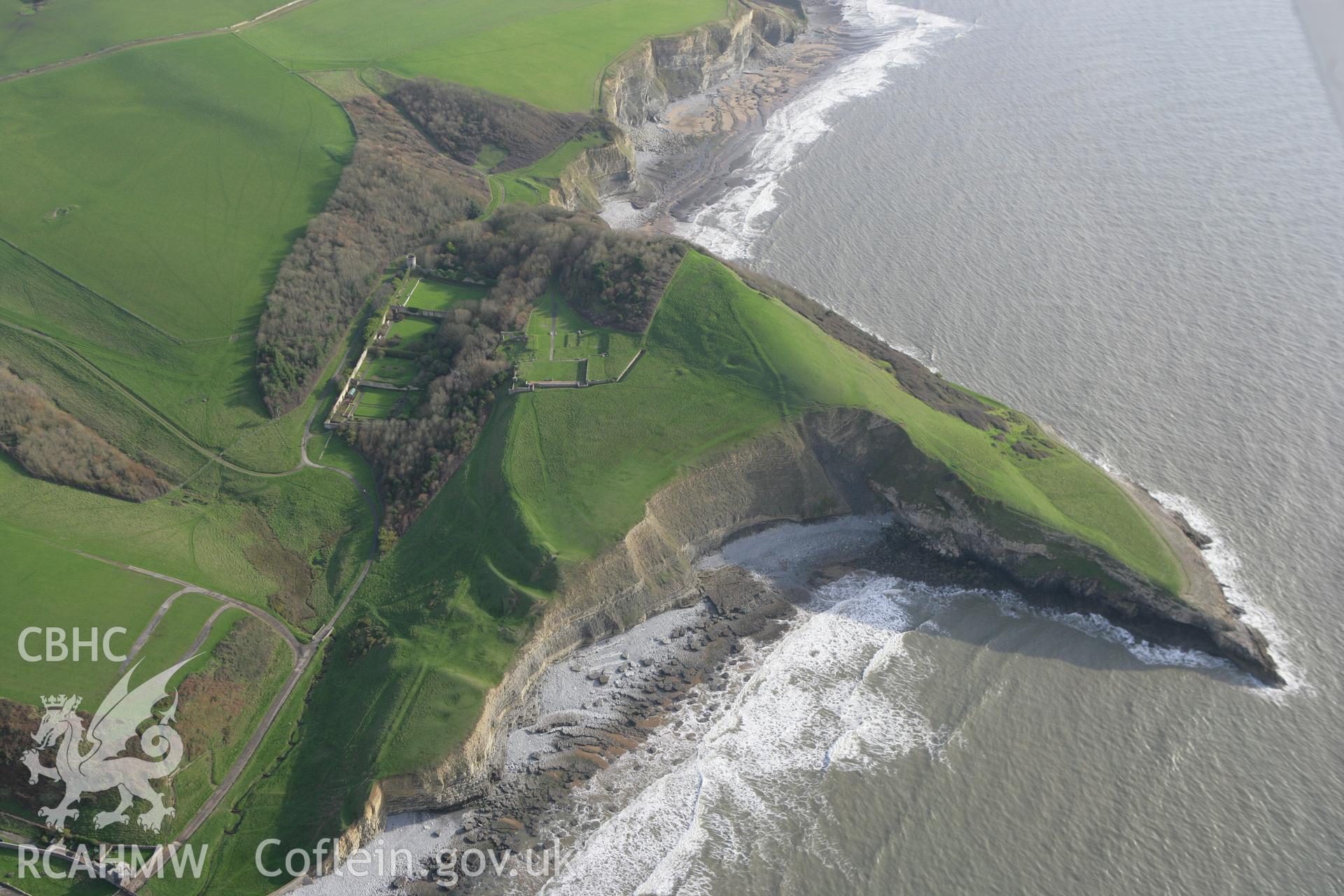 RCAHMW colour oblique photograph of Dunraven Hillfort, with Dunraven Castle, St Brides Major. Taken by Toby Driver on 17/11/2011.