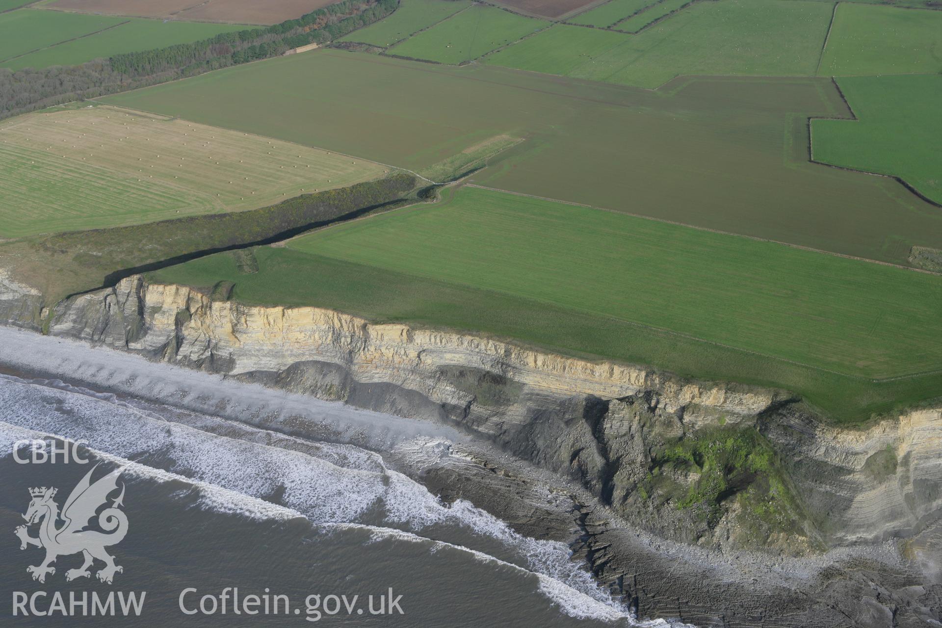 RCAHMW colour oblique photograph of Cwm Bach Enclosure. Taken by Toby Driver on 17/11/2011.