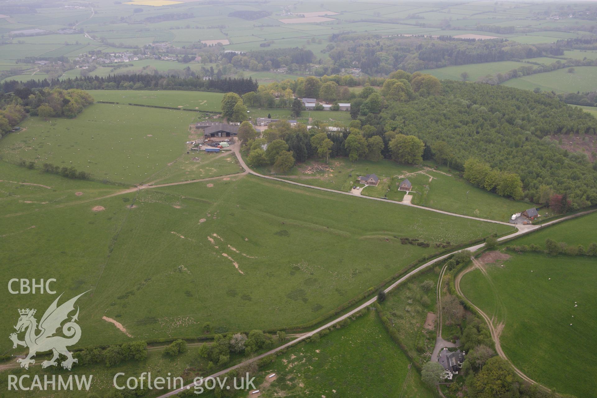 RCAHMW colour oblique photograph of Offa's Dyke, and Castle Ring. Taken by Toby Driver on 26/04/2011.