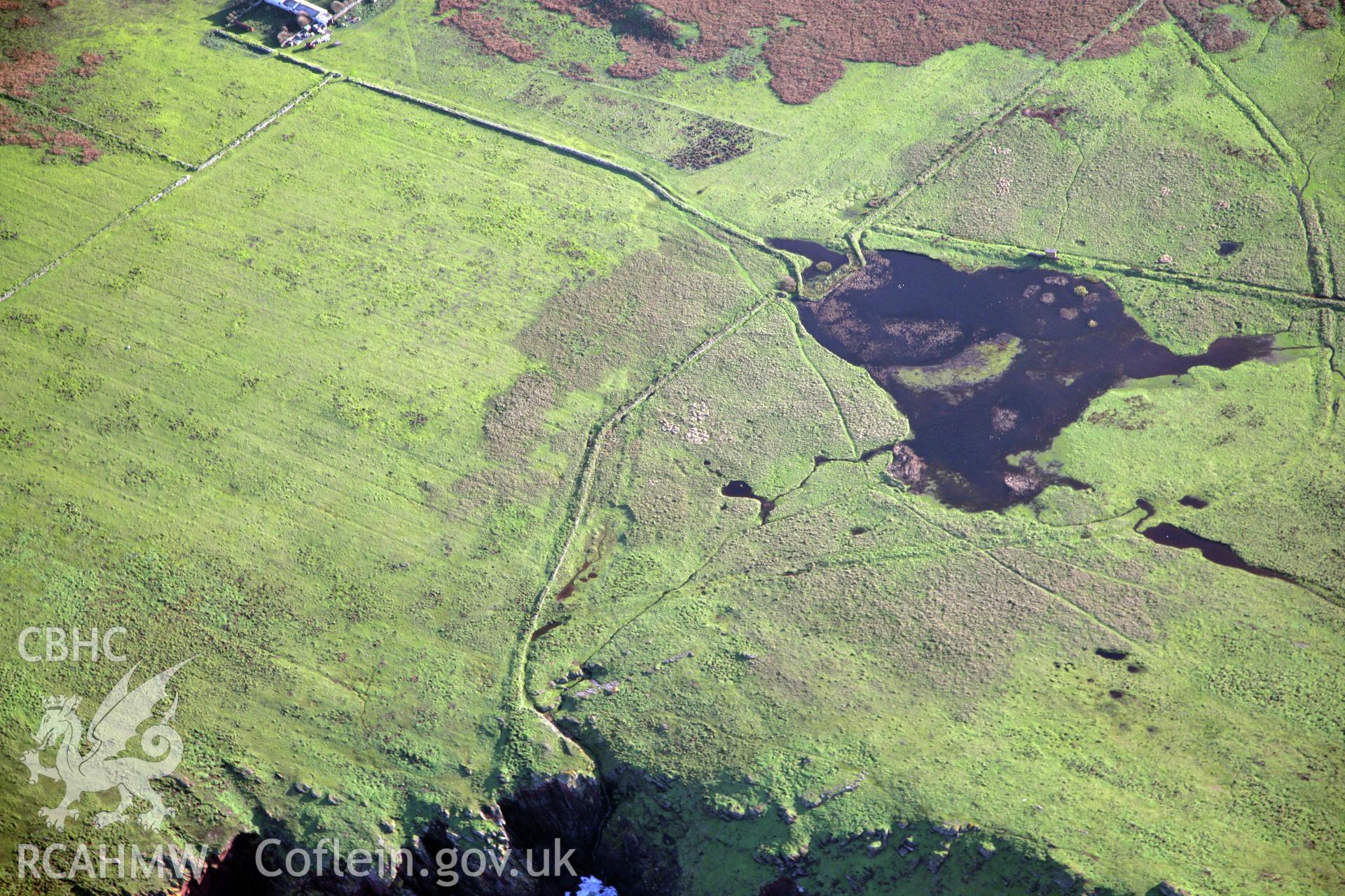 RCAHMW colour oblique photograph of farmhouse, Skokholm Island, viewed from the east. Taken by O. Davies & T. Driver on 22/11/2013.