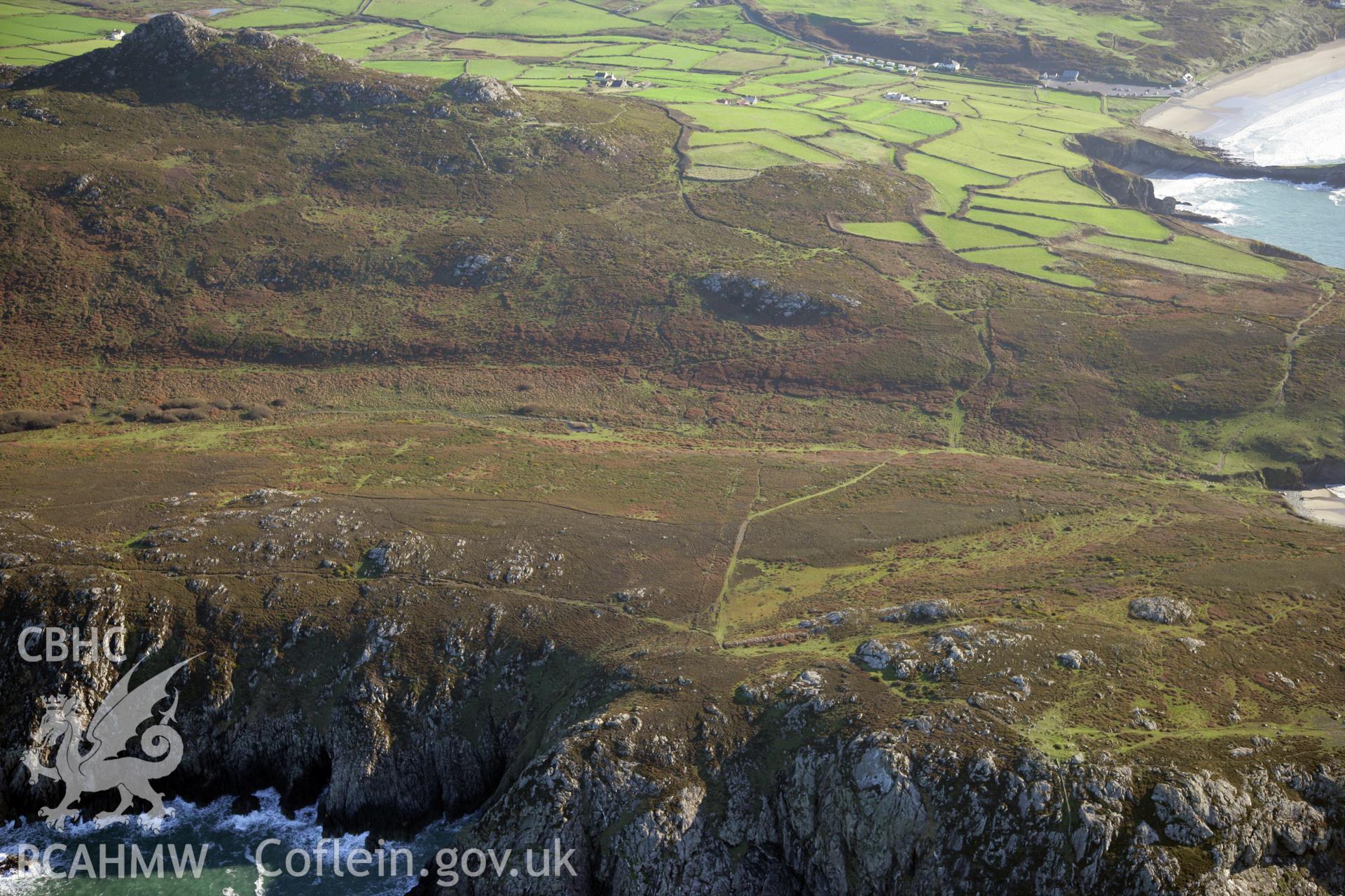 RCAHMW colour oblique photograph of Carn Llidi enclosures;Penmaen Dewi field system, St David's Head. Taken by O. Davies & T. Driver on 22/11/2013.