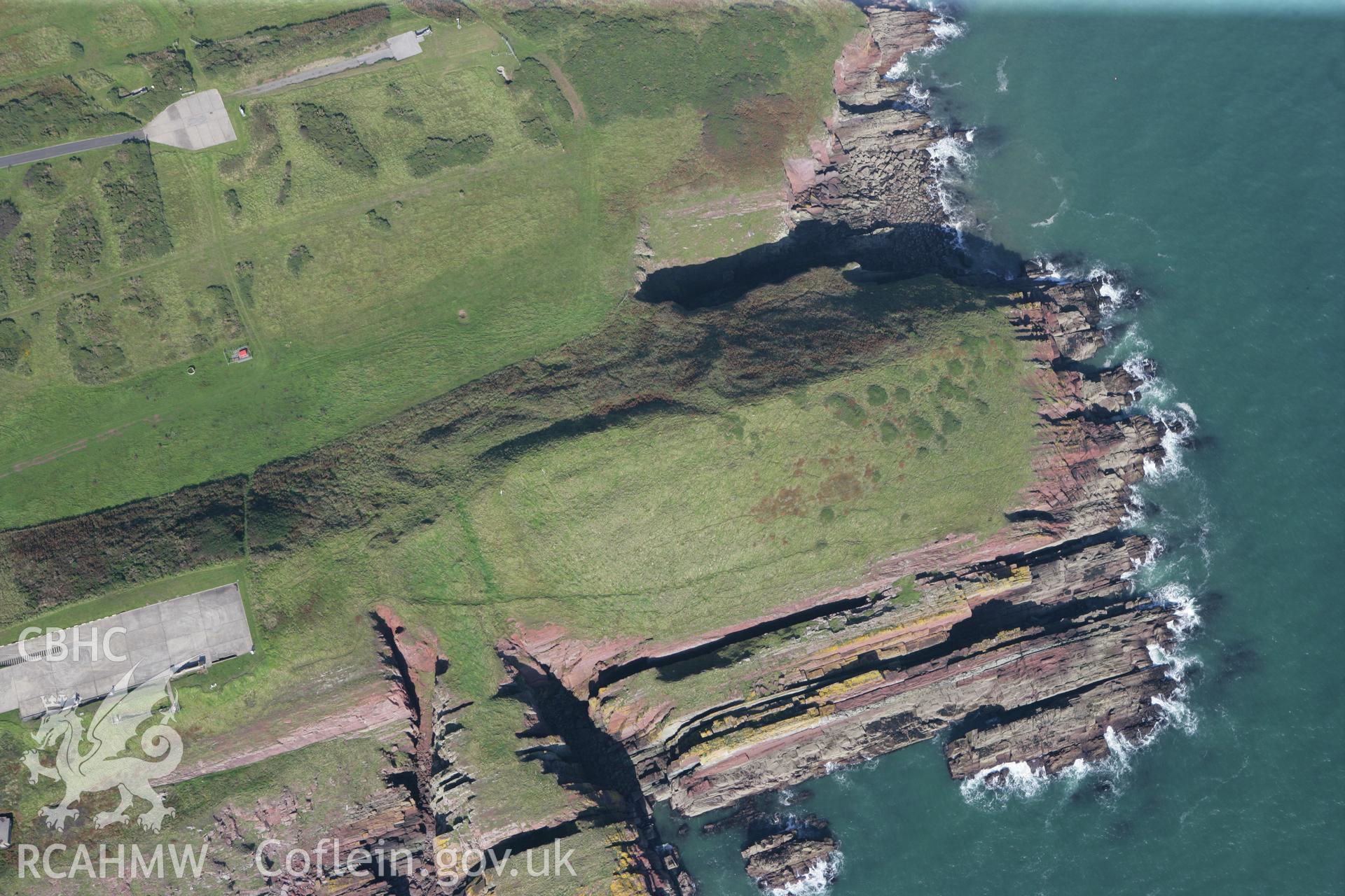 RCAHMW colour oblique photograph of Old Castle Head promontary fort, viewed from the south. Taken by Toby Driver and Oliver Davies on 28/09/2011.