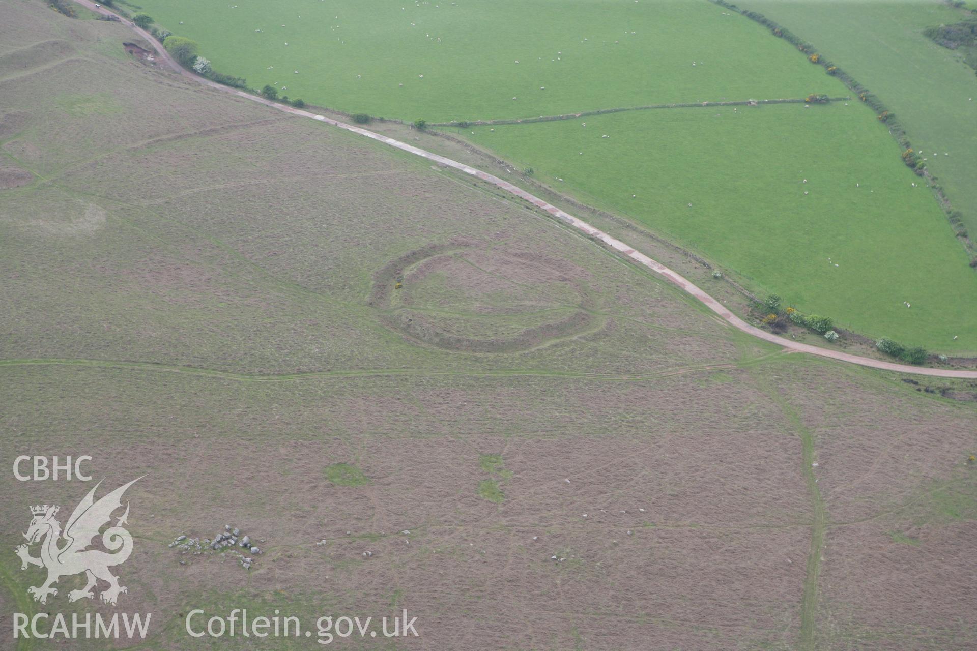 RCAHMW colour oblique photograph of Hardings Down North enclosure. Taken by Toby Driver and Oliver Davies on 04/05/2011.