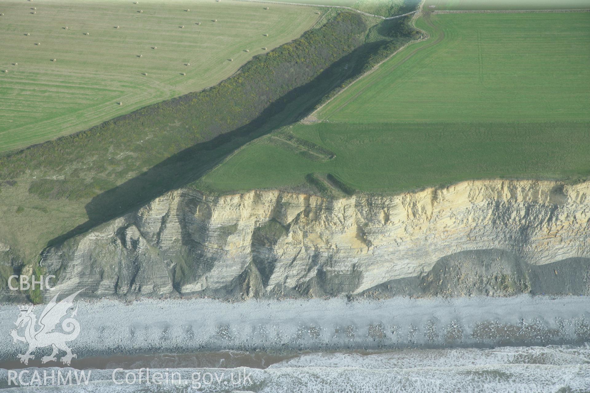 RCAHMW colour oblique photograph of Cwm Bach Enclosure. Taken by Toby Driver on 17/11/2011.