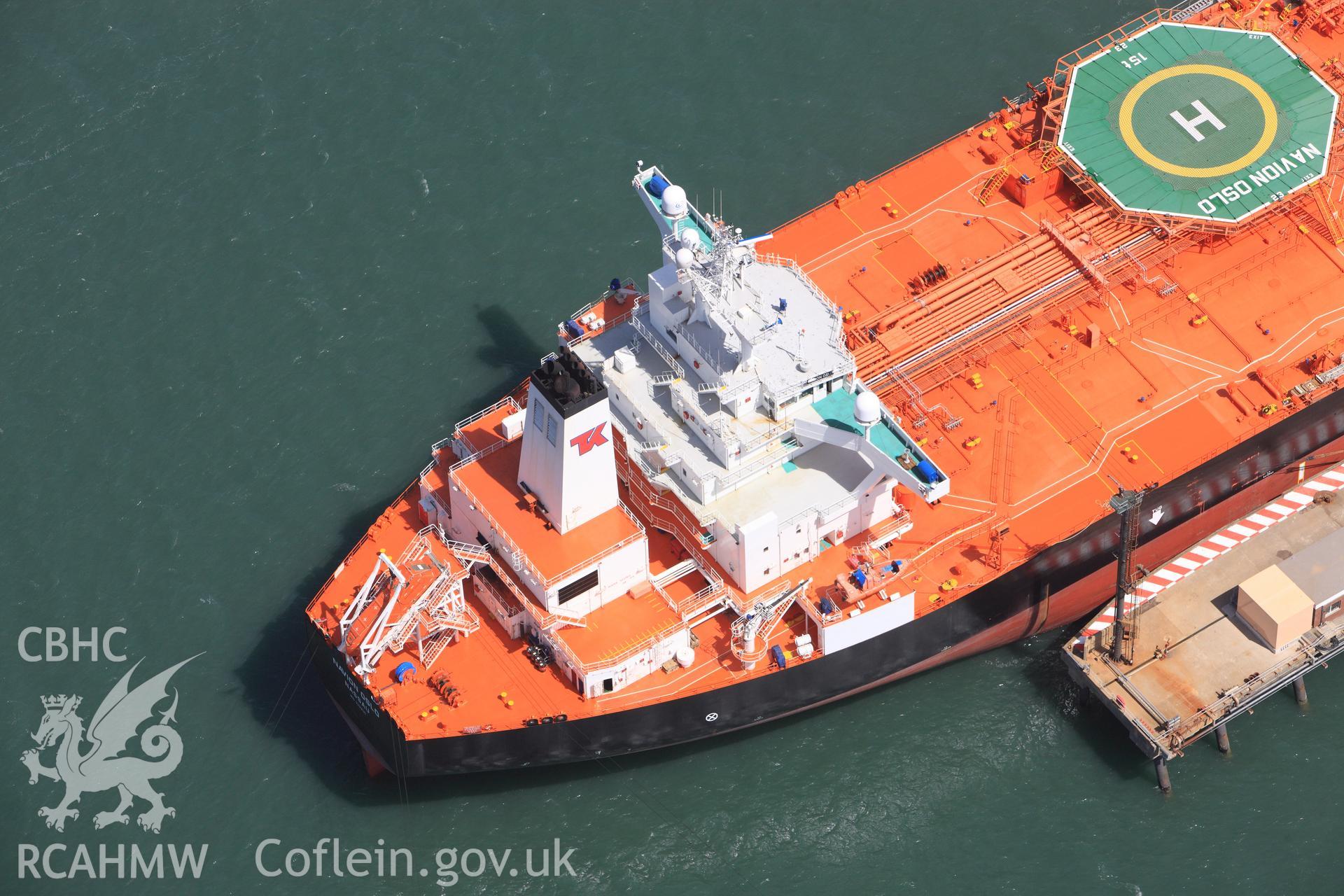 RCAHMW colour oblique photograph of Ships moored along Bullwell Bay Jetty. Taken by Toby Driver on 24/05/2011.