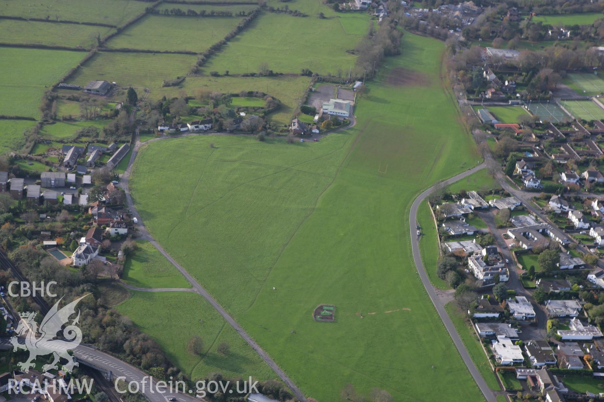 RCAHMW colour oblique photograph of Roman settlement earthworks on Dinas Powys Common. Taken by Toby Driver on 17/11/2011.