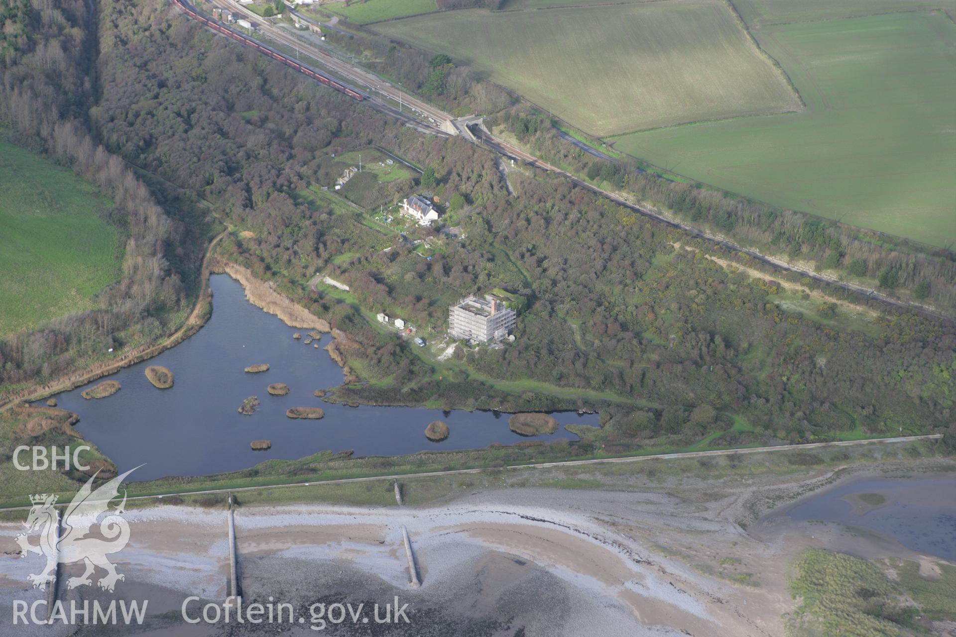 RCAHMW colour oblique photograph of Aberthaw Lime Works and Cement Works. Taken by Toby Driver on 17/11/2011.