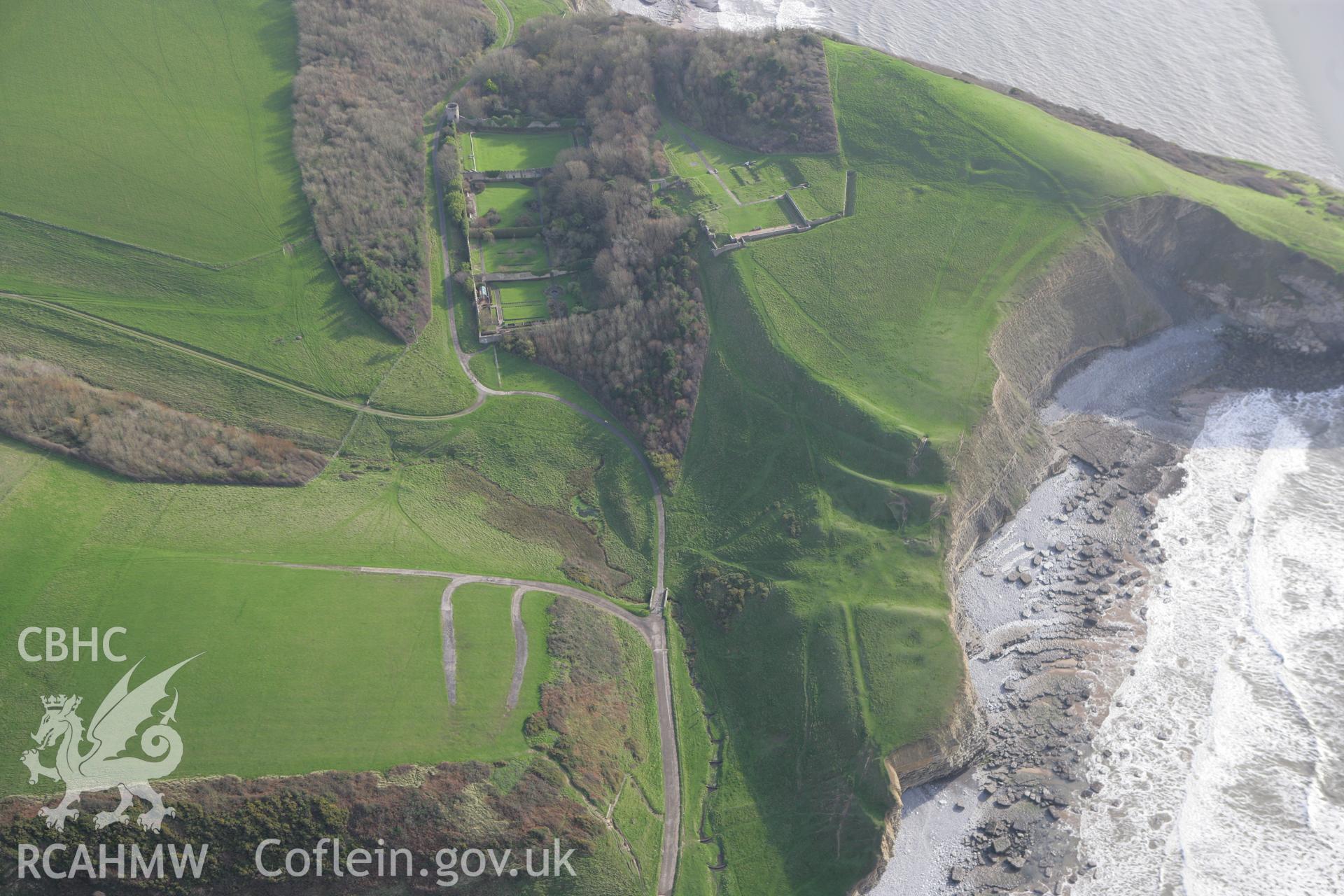 RCAHMW colour oblique photograph of Dunraven Hillfort, with Dunraven Castle, St Brides Major. Taken by Toby Driver on 17/11/2011.