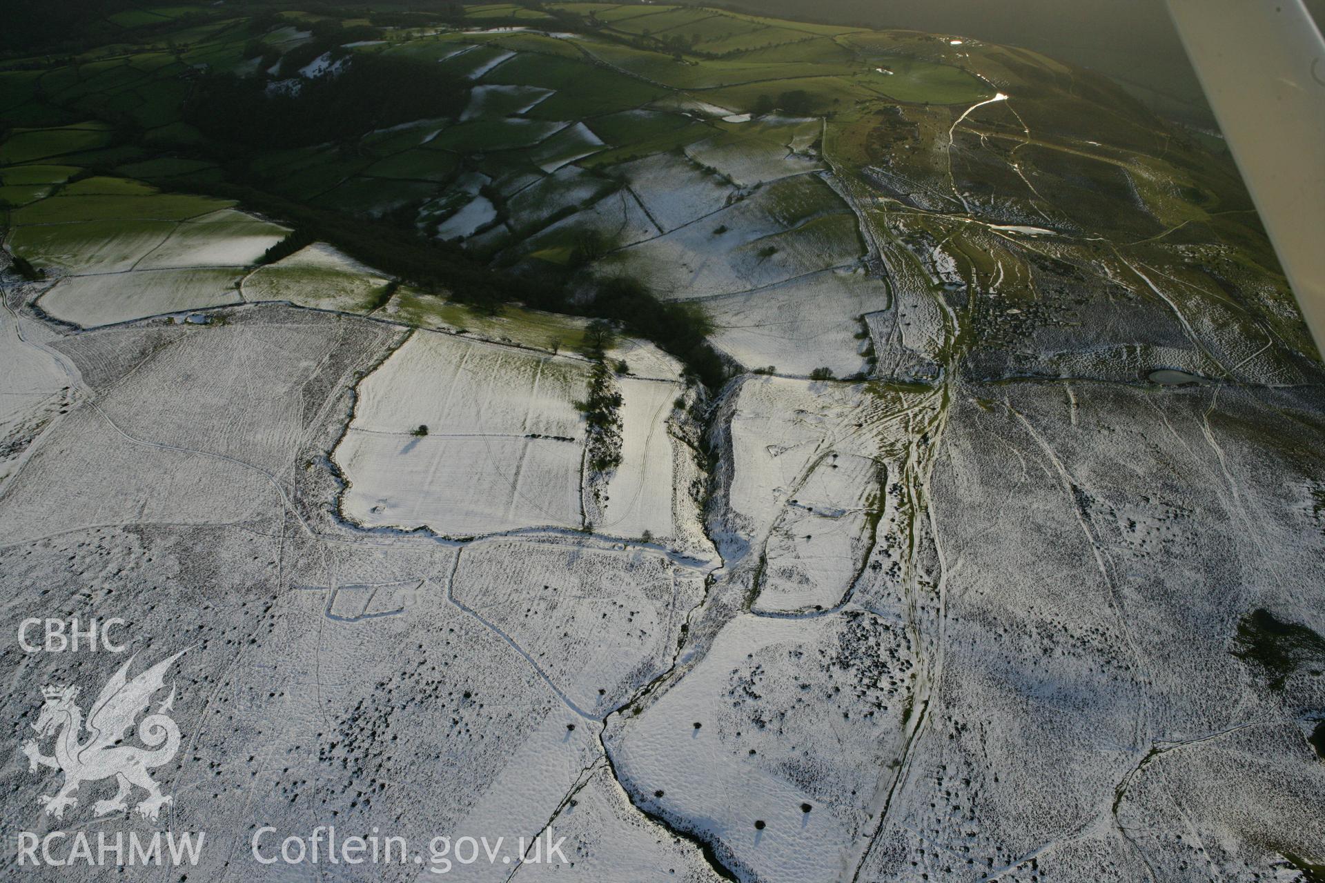 RCAHMW colour oblique photograph of Aberedw Hill deserted rural settlement. Taken by Toby Driver on 18/12/2011.