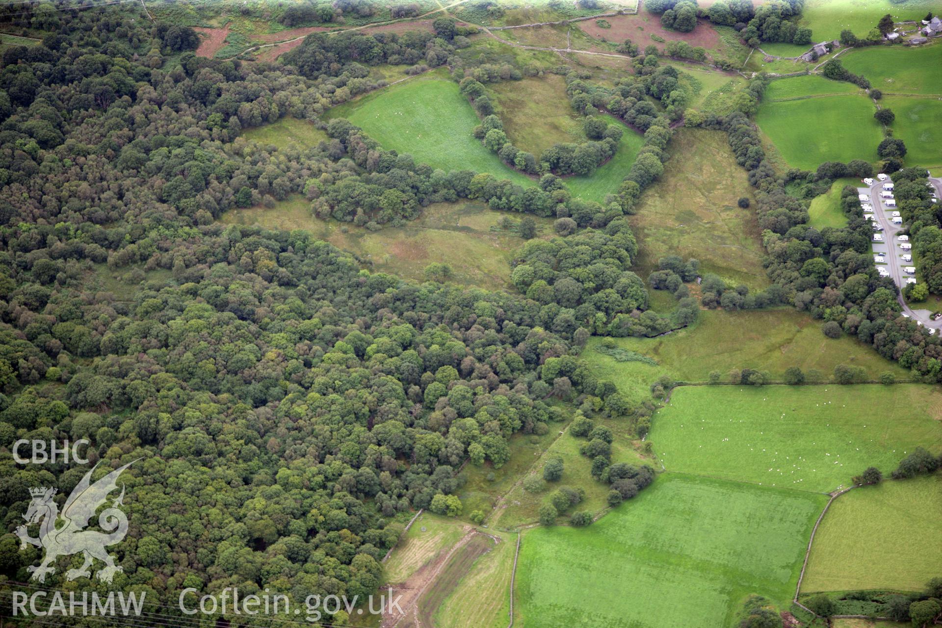 RCAHMW colour oblique photograph of Enclosed Hut Group at Nurse Cae Du. Taken by Toby Driver on 17/08/2011.