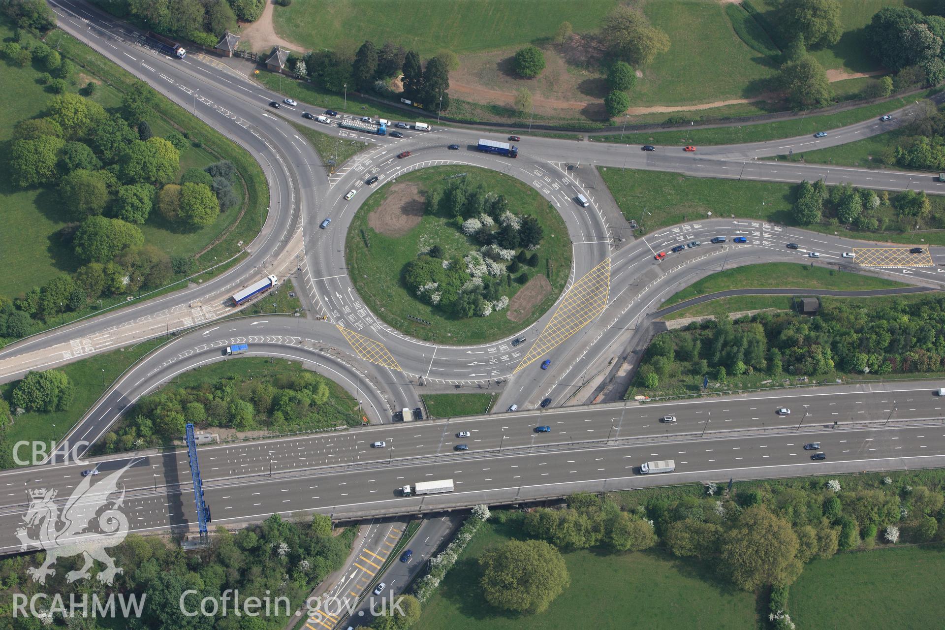 RCAHMW colour oblique photograph of Tredegar, M4 motorway rooundabout, and parkland. Taken by Toby Driver on 26/04/2011.