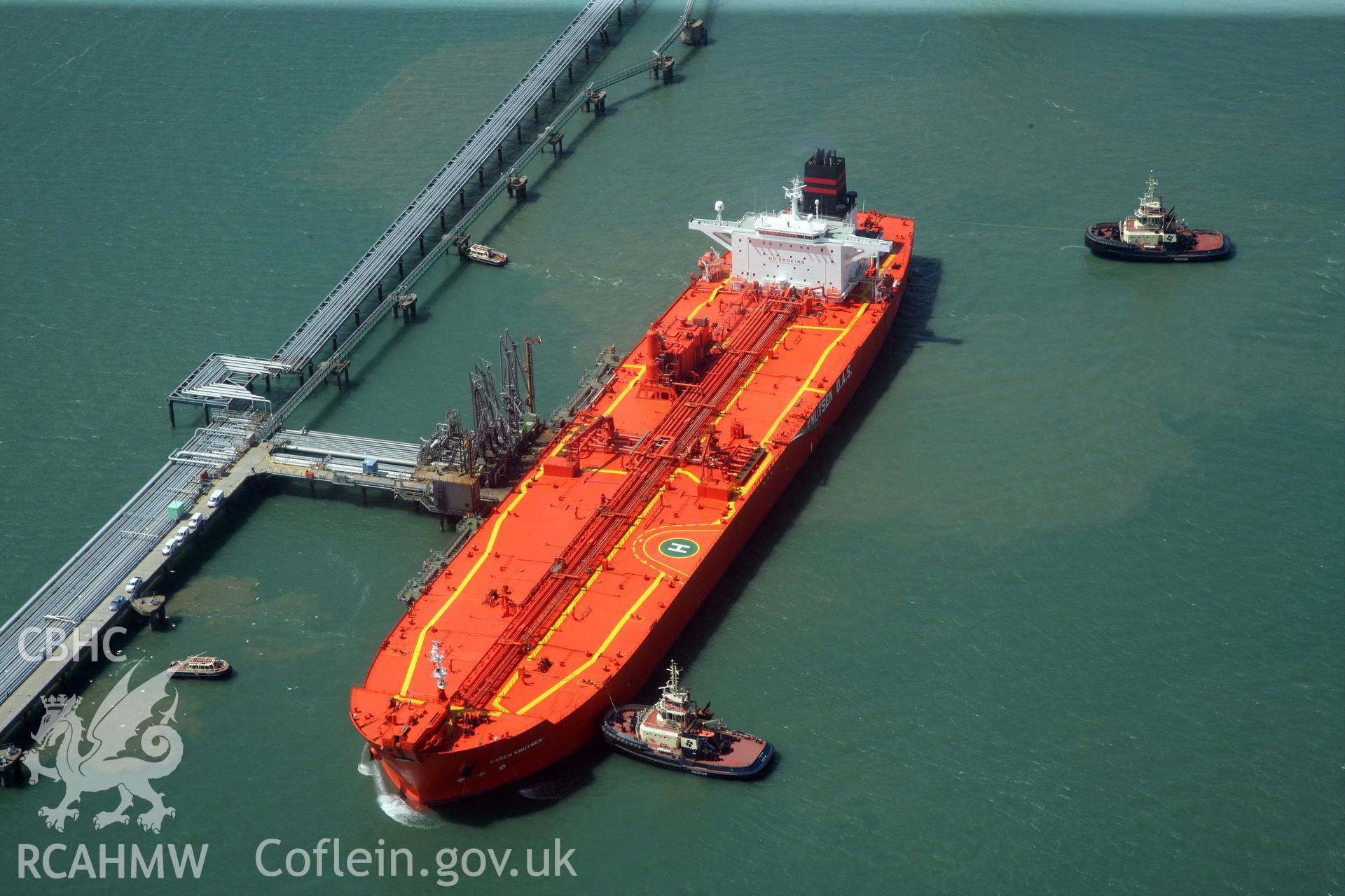 RCAHMW colour oblique photograph of Ships moored along Bullwell Bay Jetty. Taken by Toby Driver on 24/05/2011.