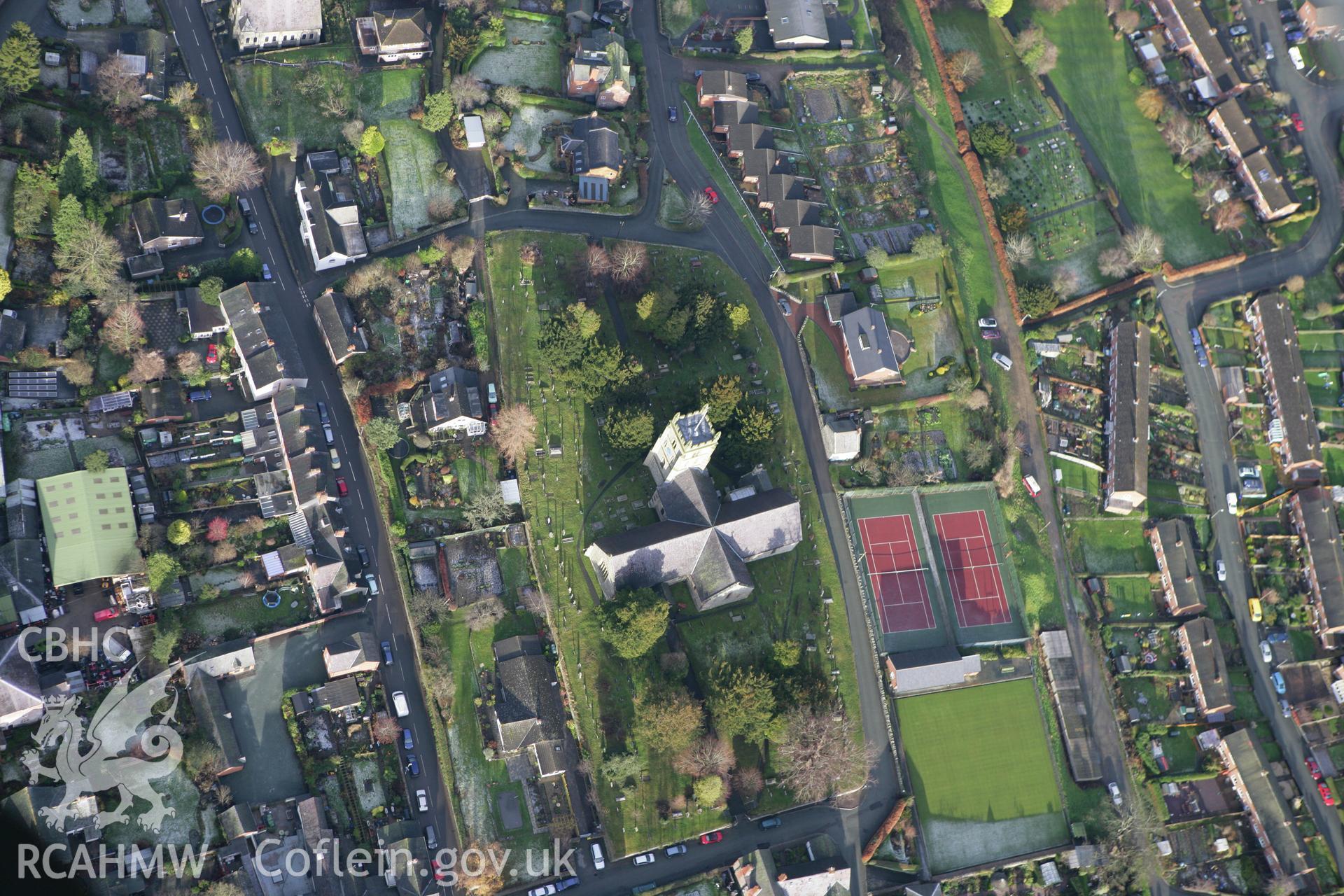 RCAHMW colour oblique photograph of St Nicolas' Church, Montgomery, and town defences. Taken by Toby Driver on 18/12/2011.