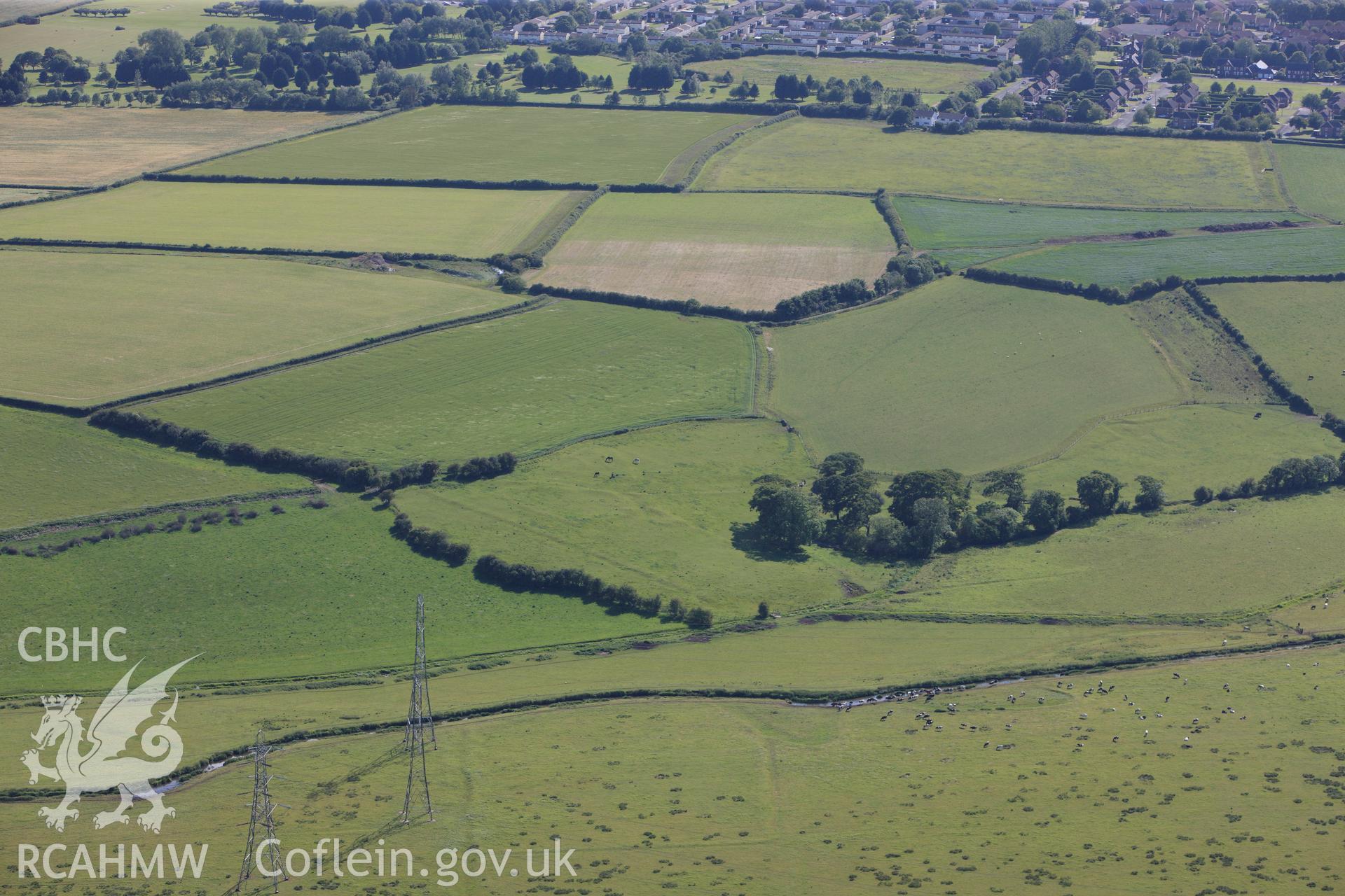 RCAHMW colour oblique photograph of Flemingston settlement earthworks. Taken by Toby Driver on 13/06/2011.