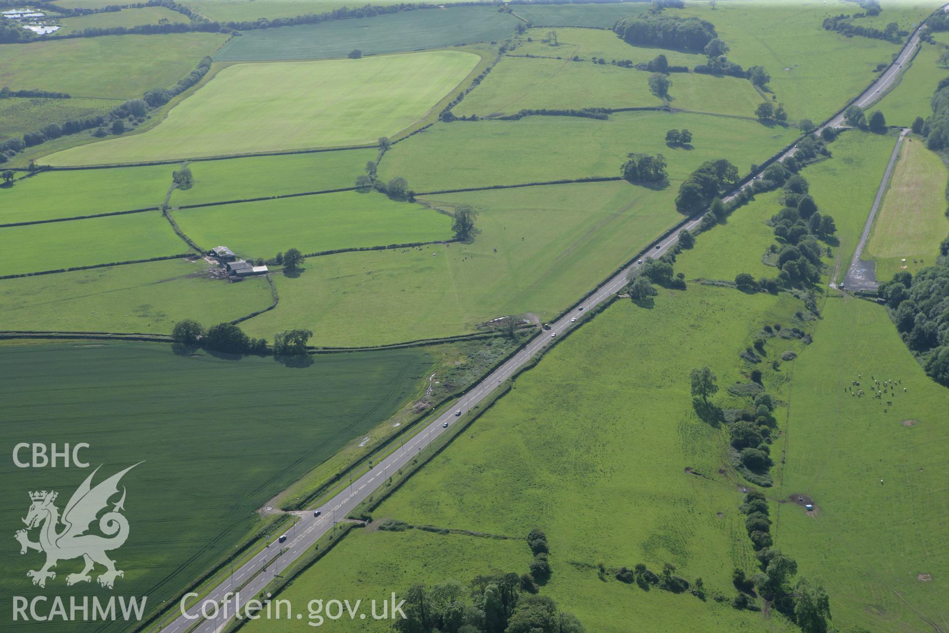 RCAHMW colour oblique photograph of Corrwg mounds. Taken by Toby Driver on 13/06/2011.