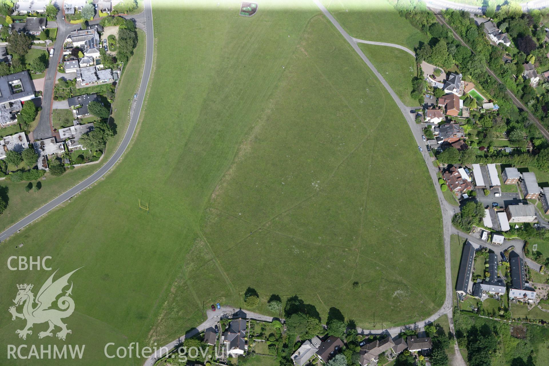 RCAHMW colour oblique photograph of Settlement earthworks on Dinas Powys Common. Taken by Toby Driver on 13/06/2011.