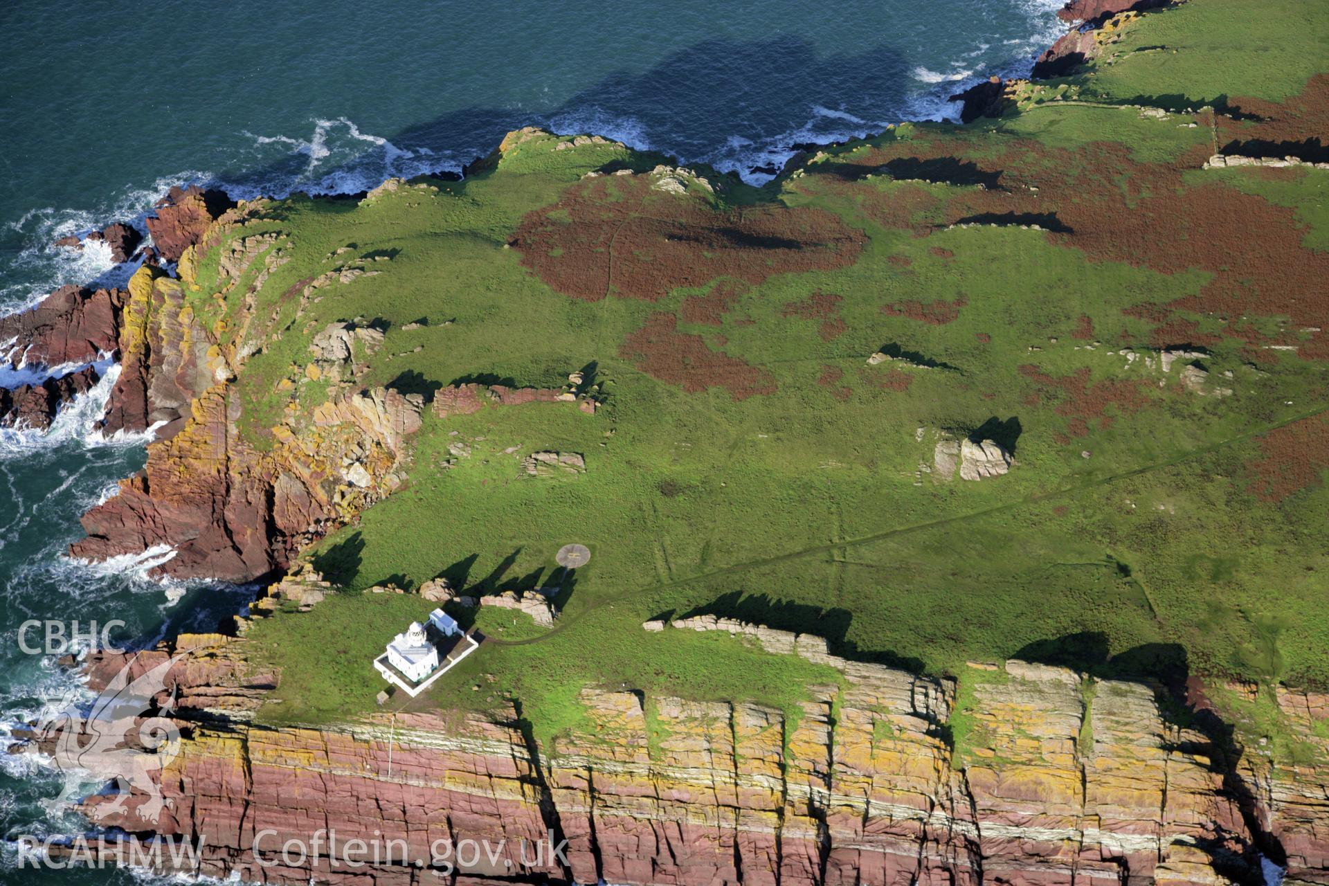 RCAHMW colour oblique photograph of Skokholm Island lighthouse, viewed from the south. Taken by O. Davies & T. Driver on 22/11/2013.