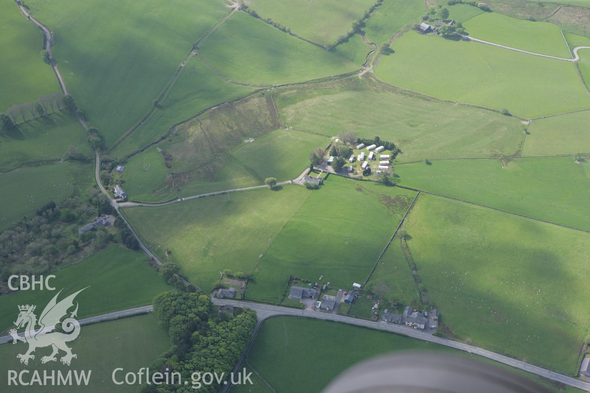 RCAHMW colour oblique photograph of Bryn Teg Enclosure. Taken by Toby Driver on 03/05/2011.