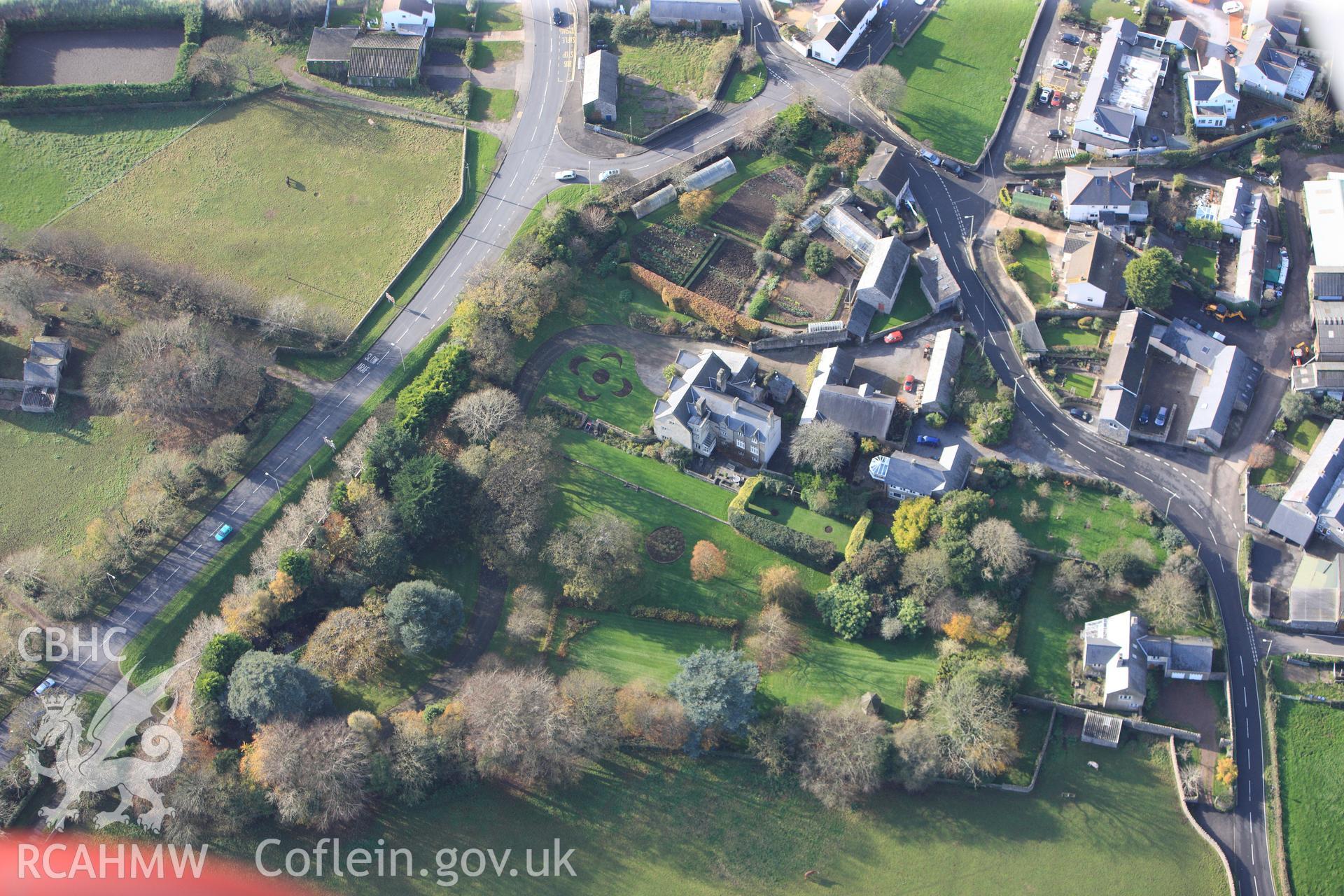 RCAHMW colour oblique photograph of Nottage Court, with Roman Milestone. Taken by Toby Driver on 17/11/2011.