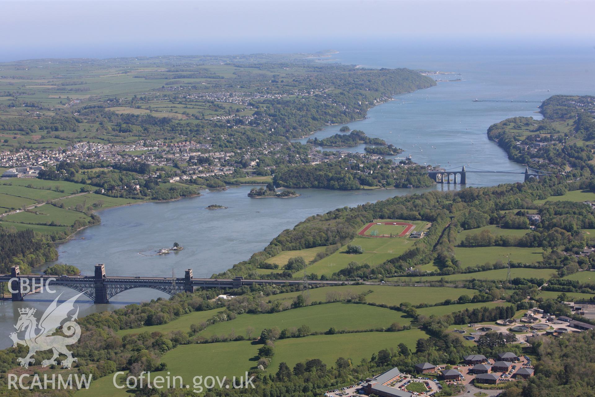 RCAHMW colour oblique photograph of Pont Britannica and the Menai Suspension Bridge, Menai Straits. Taken by Toby Driver on 03/05/2011.