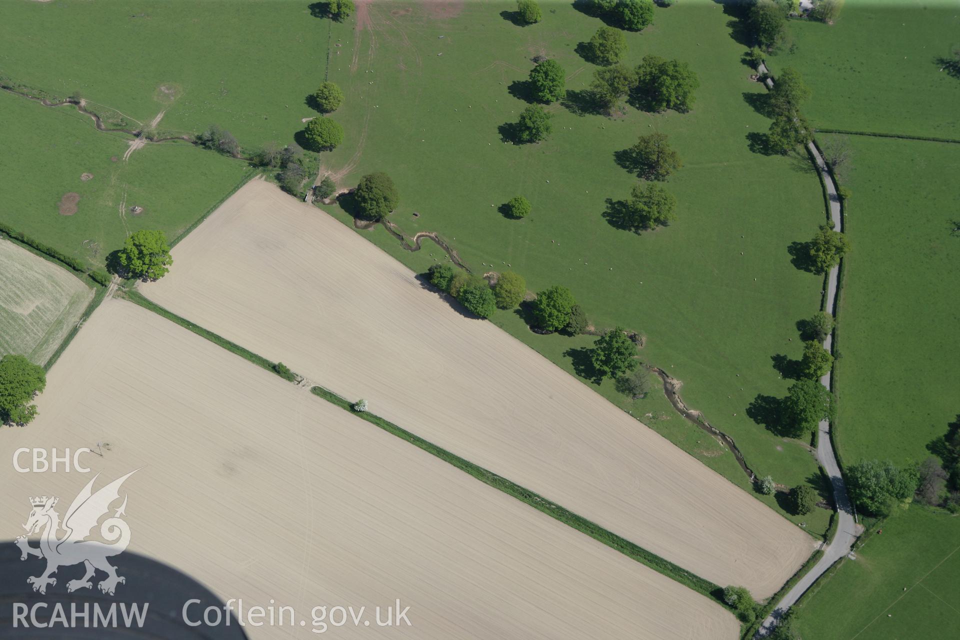 RCAHMW colour oblique photograph of the site of Plas Newydd Roman Temple. Taken by Toby Driver on 03/05/2011.