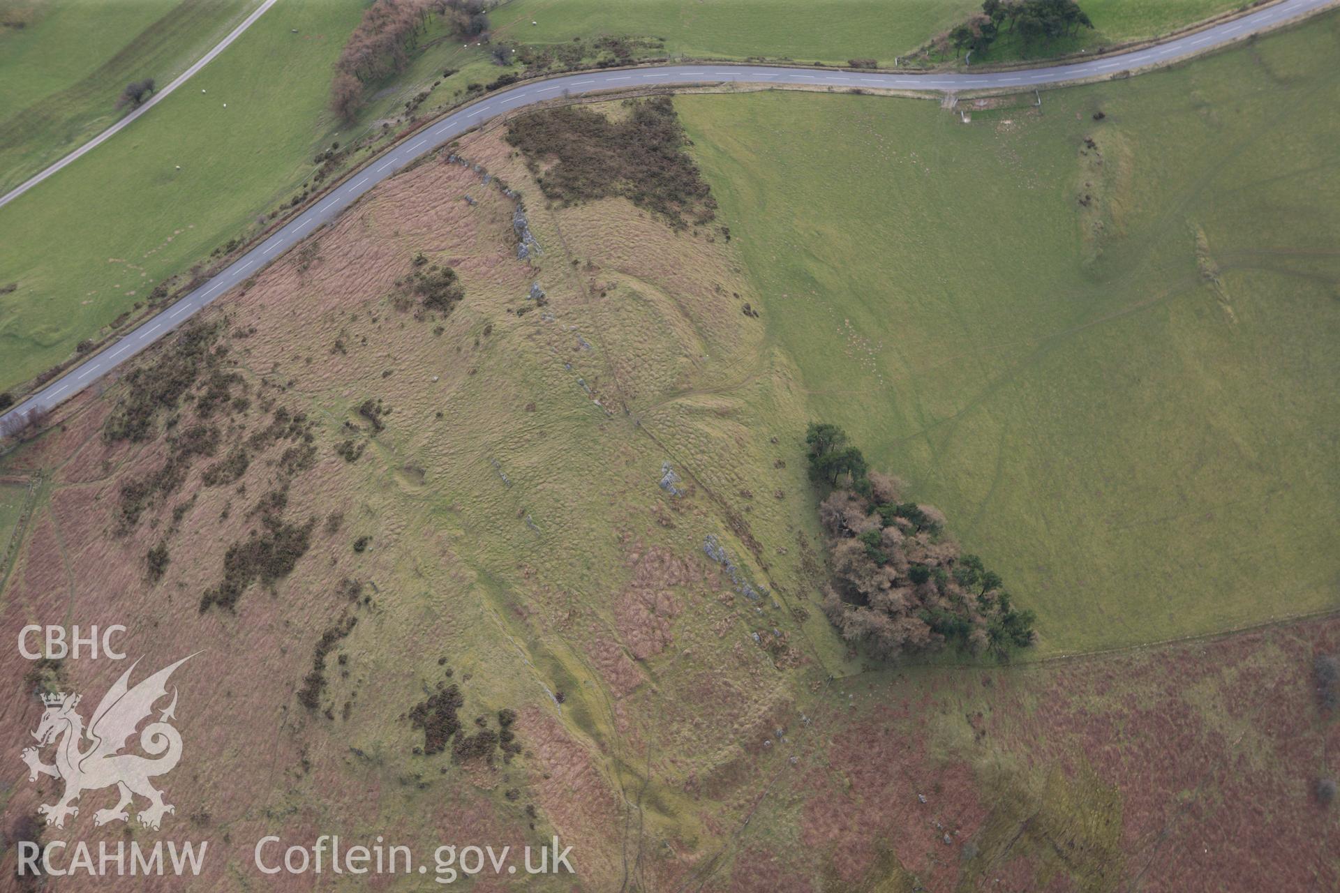 RCAHMW colour oblique photograph of Pen-y-Clun Hillfort. Taken by Toby Driver on 22/03/2011.