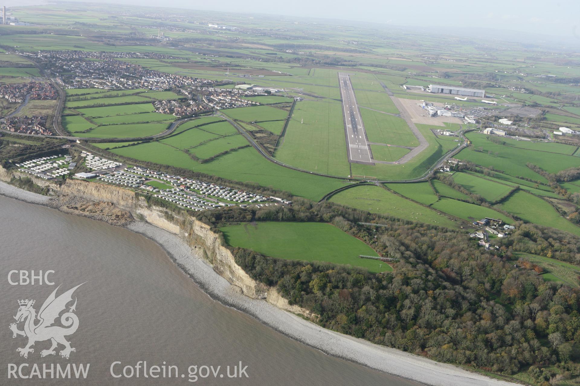 RCAHMW colour oblique photograph of Bulwarks Camp Hillfort, with landslip. Taken by Toby Driver on 17/11/2011.